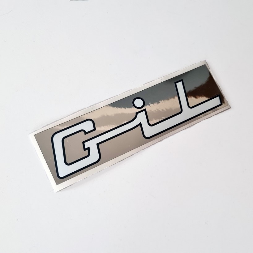 Naklejka Romet Gil na rower napis na srebrnym tle