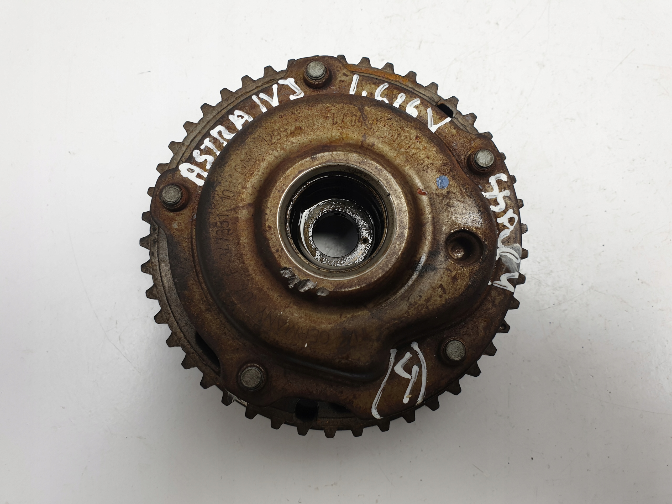 Opel Astra IV J 1.6 16V колесо распределительного вала 12992410