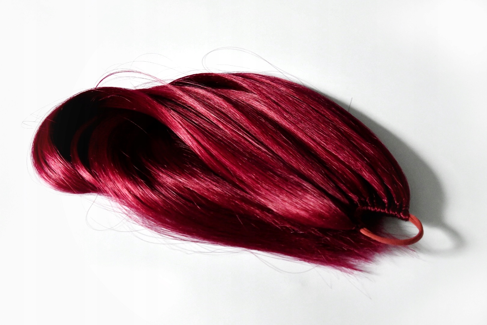 Culík na gumičce, prodloužení culíku Karmínový M 80g