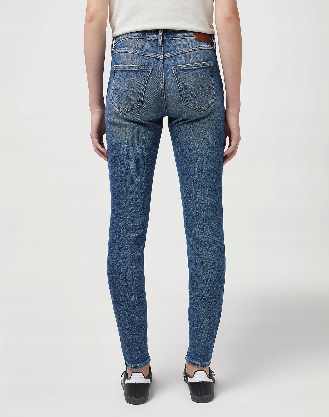 Dámské džínové úzké nohavice kalhoty Wrangler Skinny MID Wash 112351743 28/32