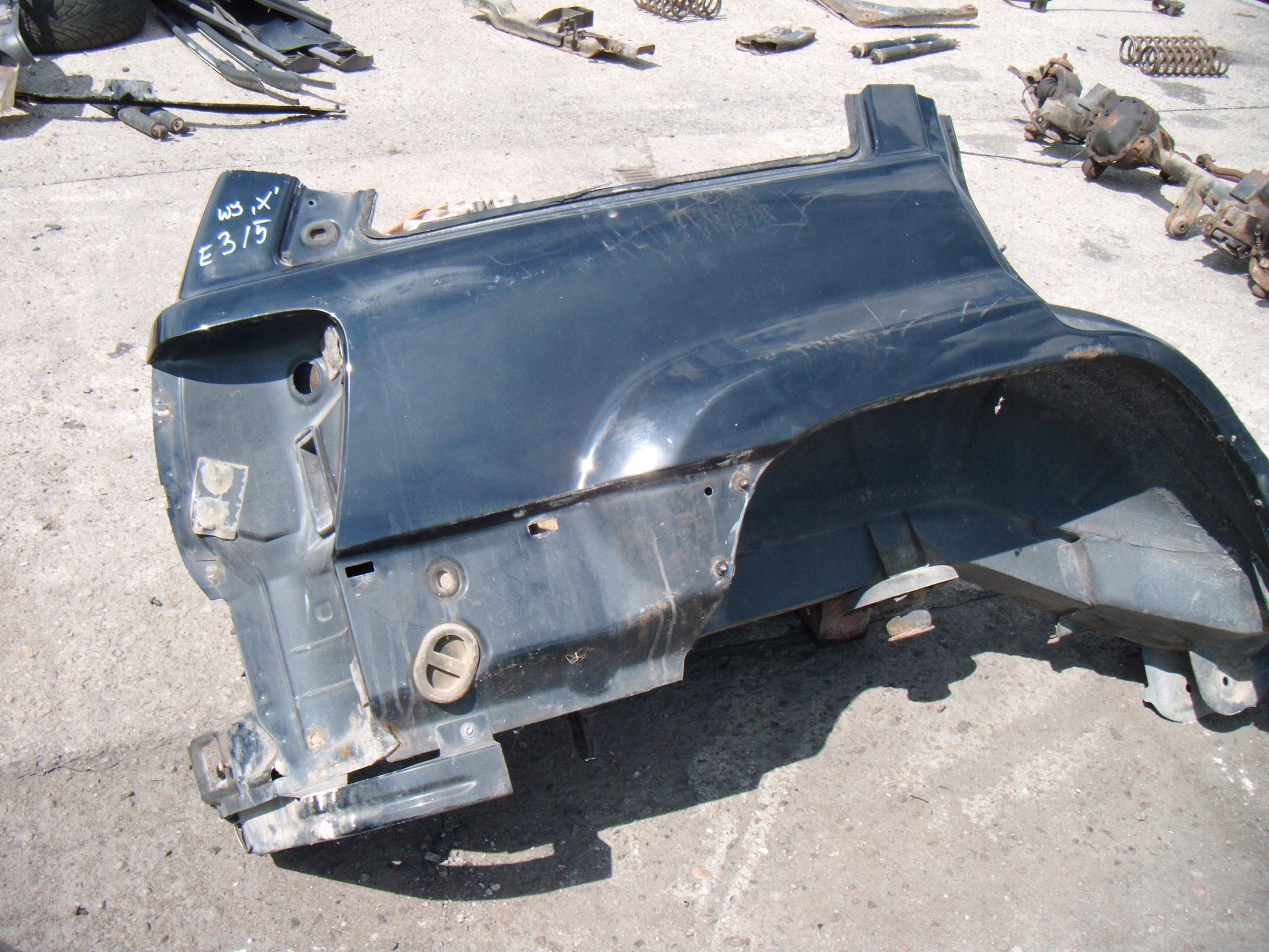 GRAND CHEROKEE WJ 98- BŁOTNIK ĆWIARTKA PRAWY TYŁ