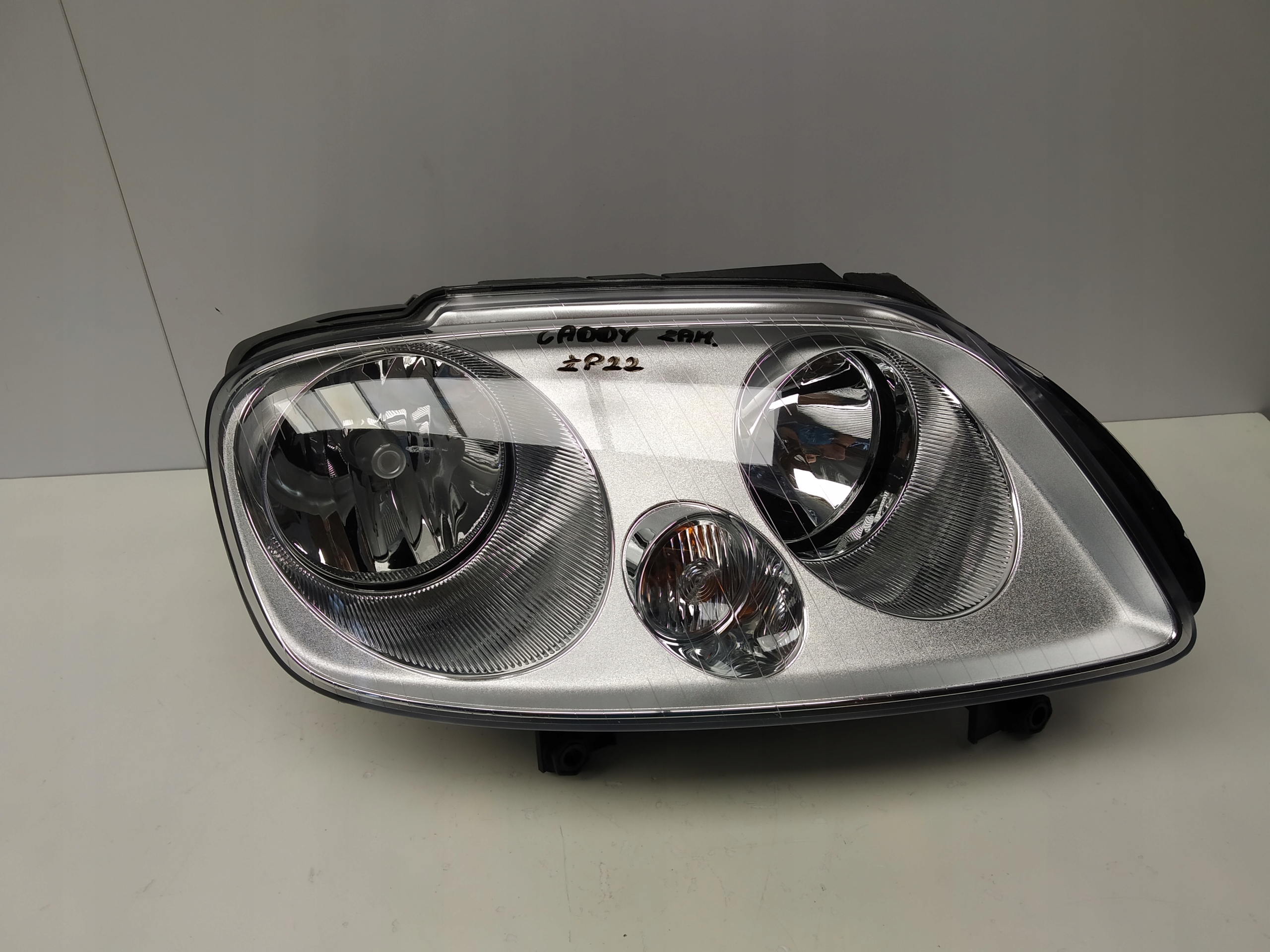 2003-2010r Vw Caddy reflektor light front right before lift Visteon