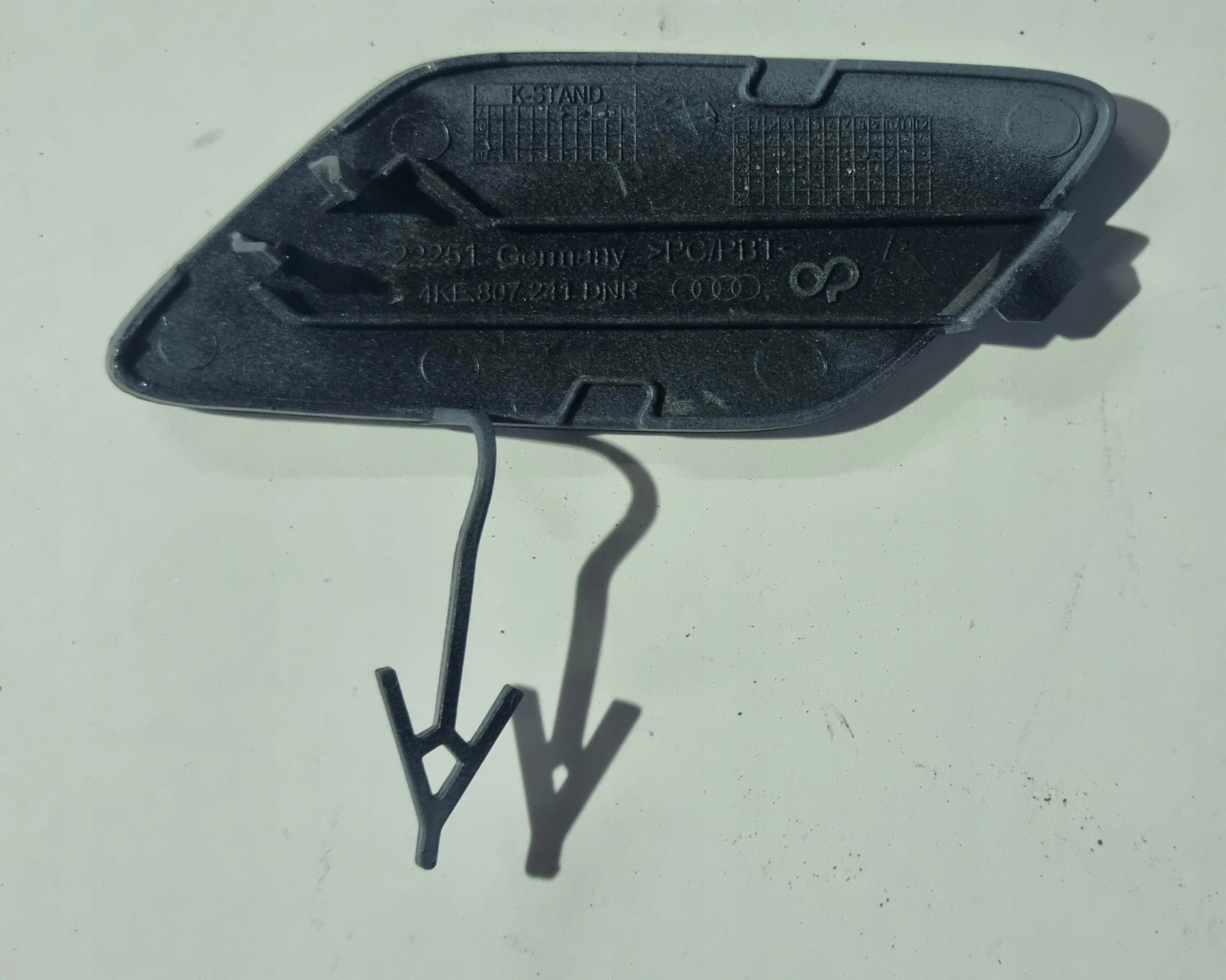 towing hook cap of a bumper front AUDI E-TRON