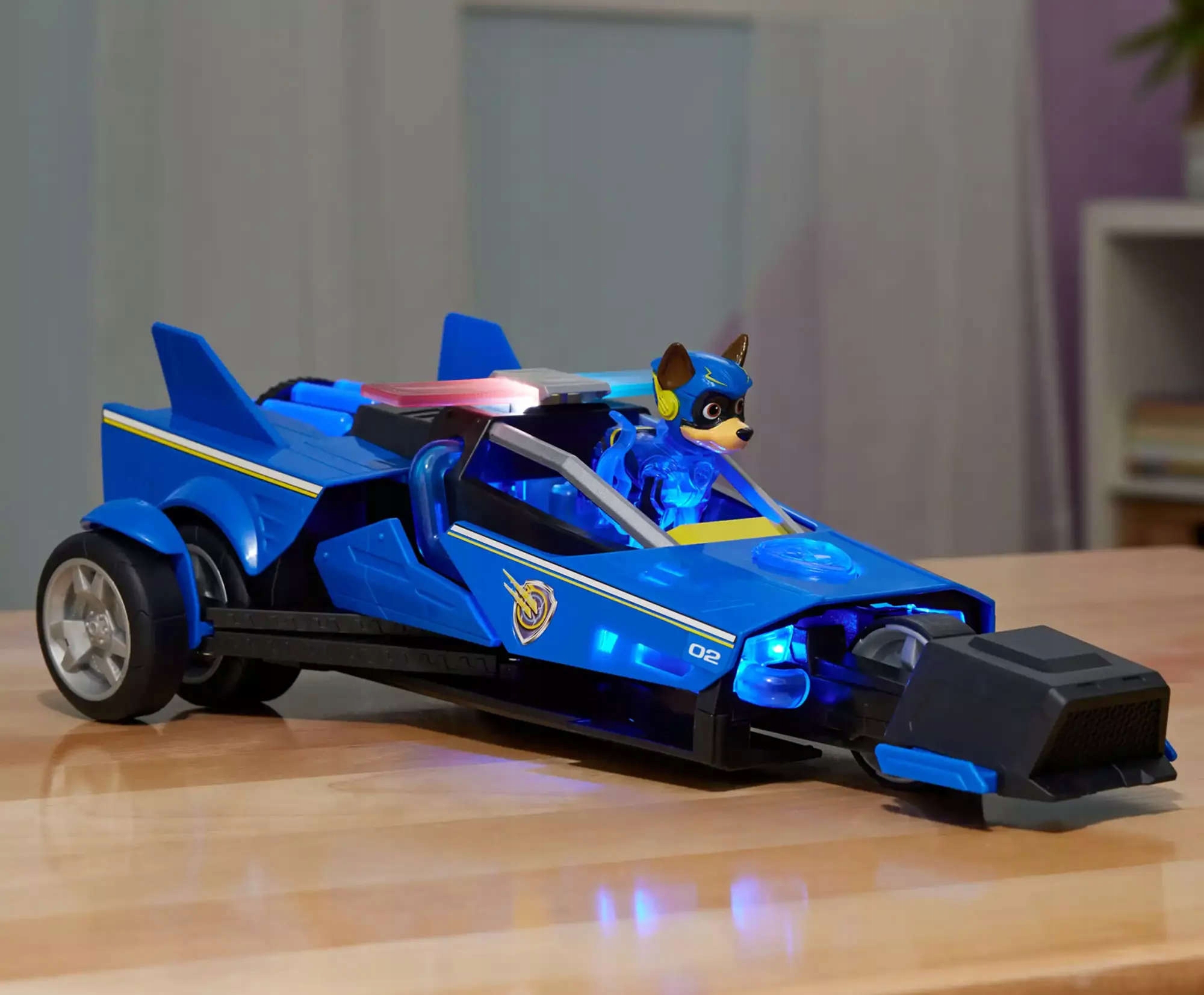 PSI PATROL WIELKI FILM POJAZD KOSMICZNY RADIOWÓZ CHASE DELUXE 2W1 FIGURKA Model Chase Mighty Transforming Cruiser