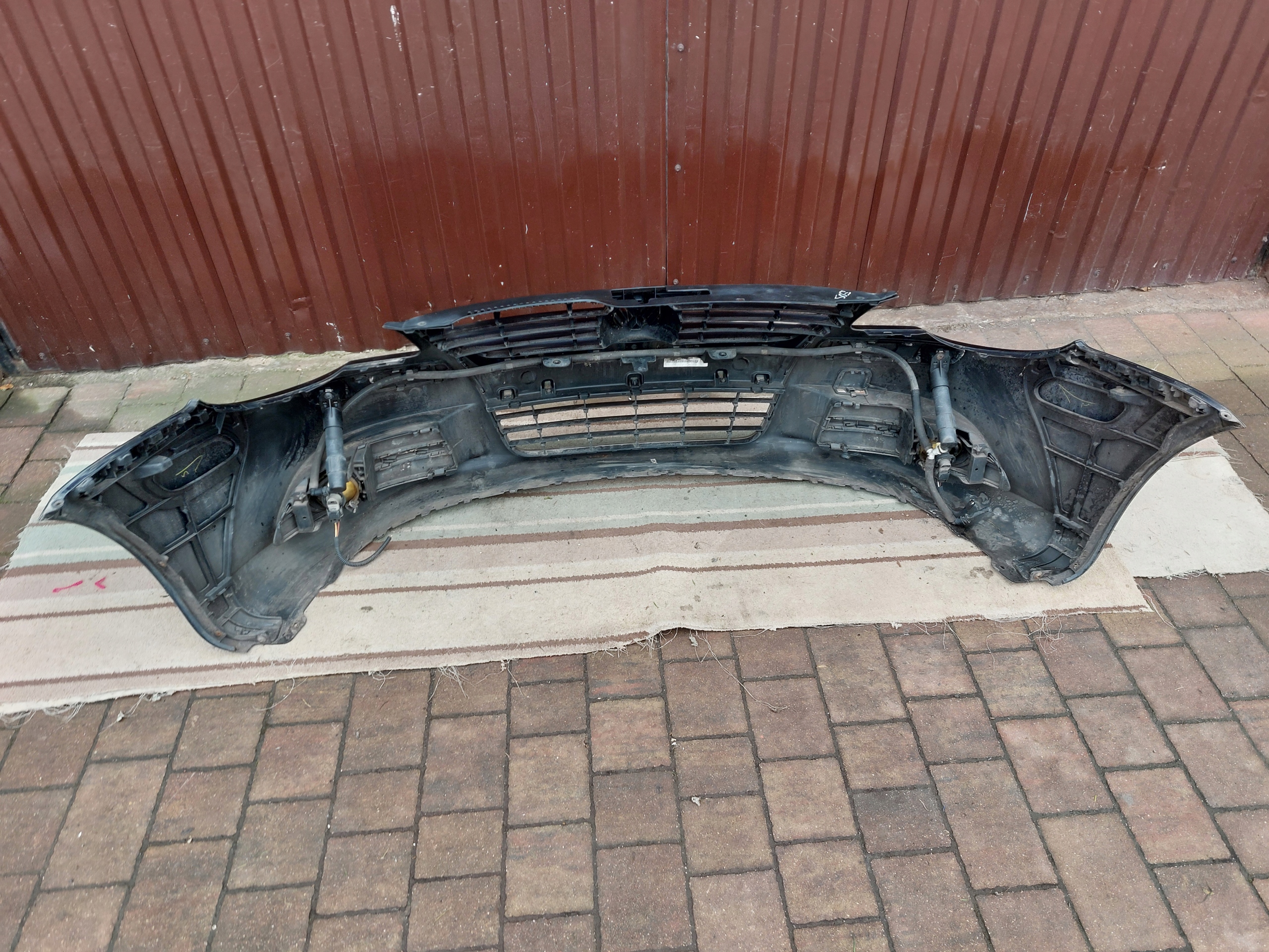 bumper front VW EOS 08r washers complete black