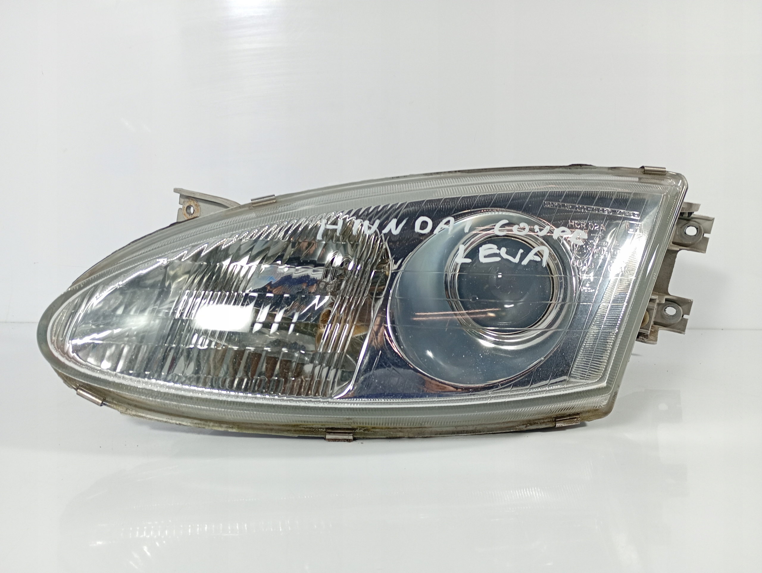 Hyundai Coupe 2 96-01 REFLEKTOR light left front front OE 1010495