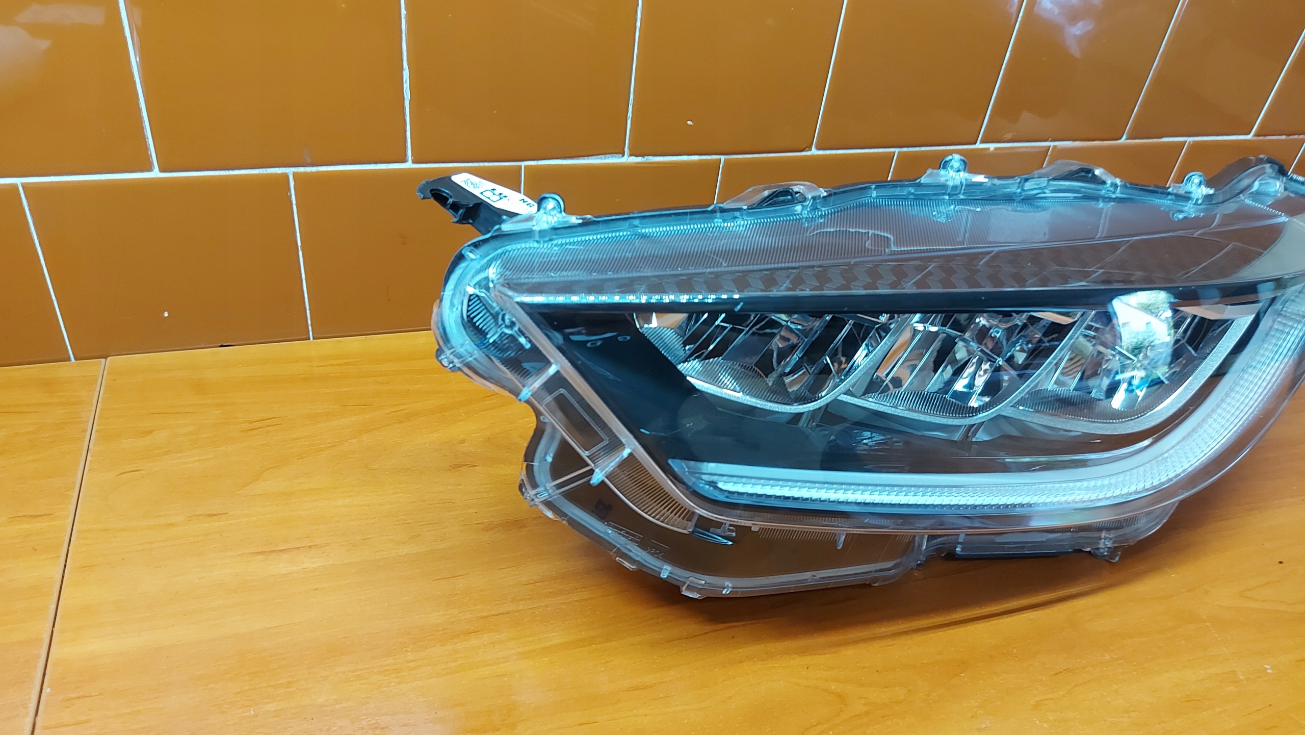 REFLEKTOR light left left front TOYOTA YARIS IV 20