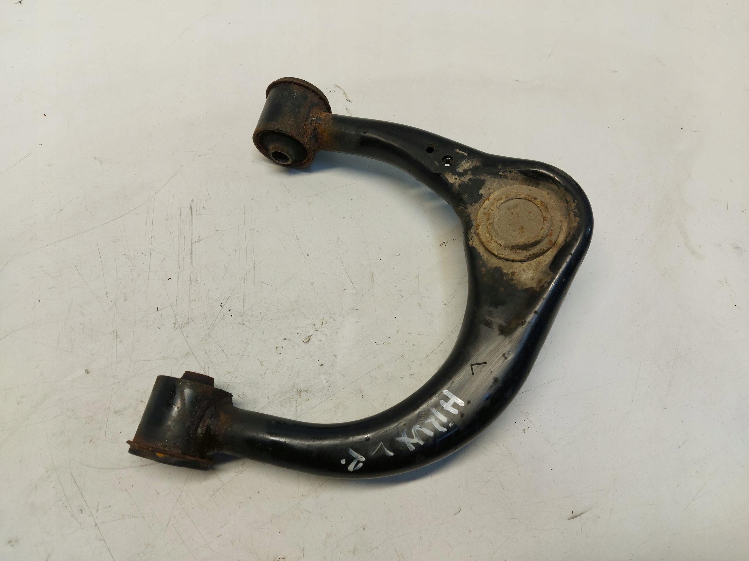 Toyota Hilux VIII arm left front front upper