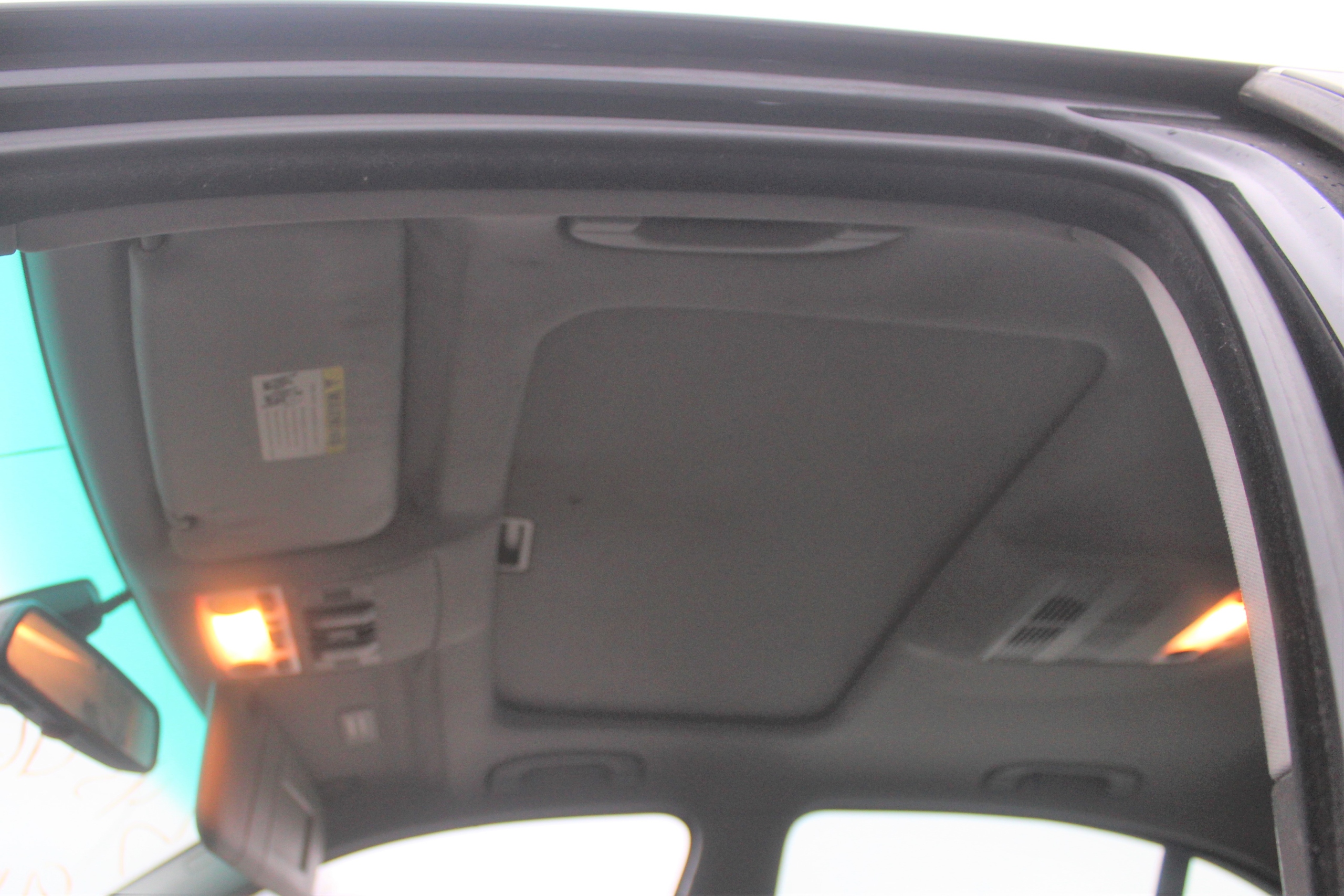 Обшивка стелі BMW E60 седан на даху