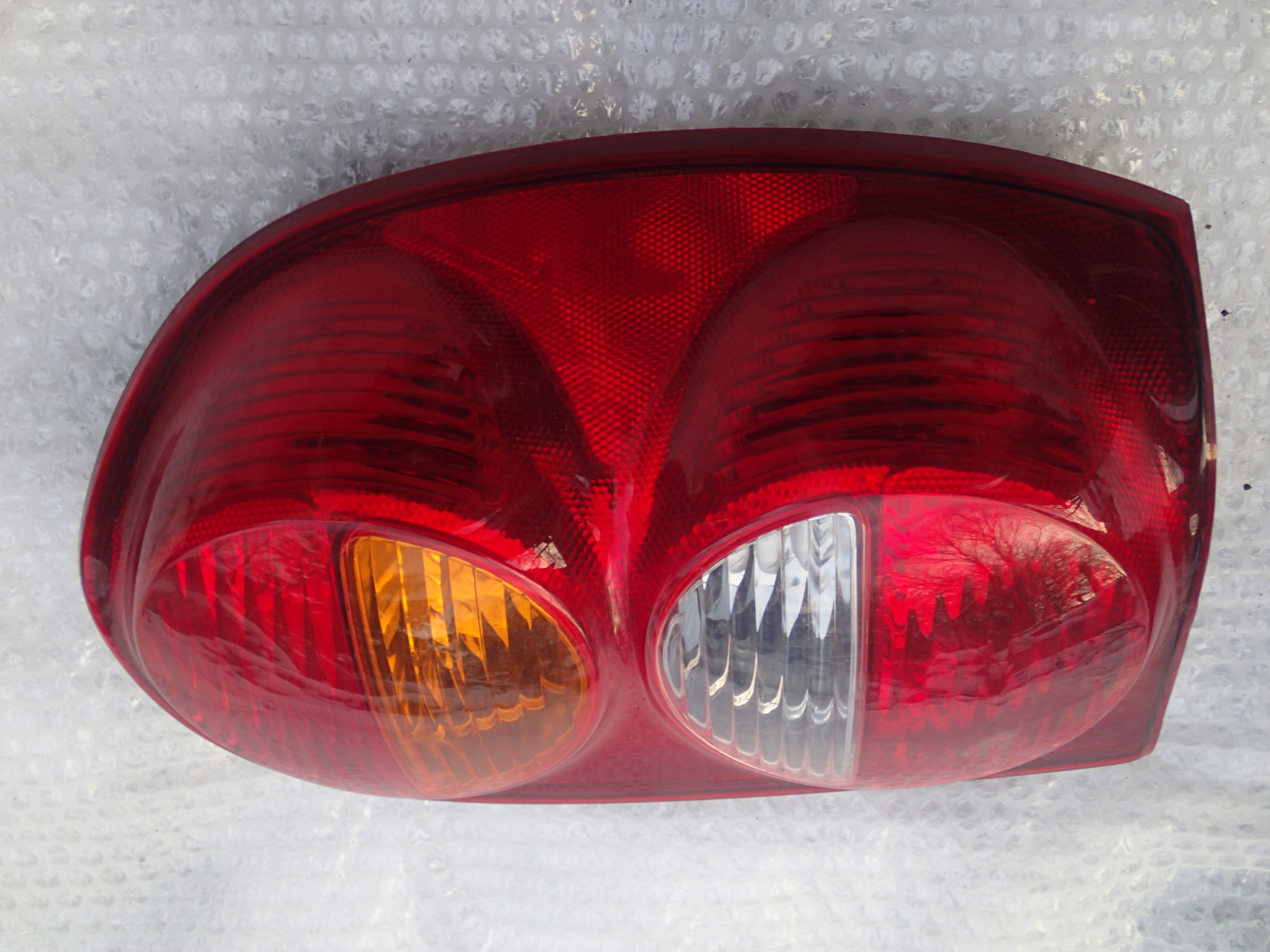 CHEROKEE LIBERTY KJ фонарь правый