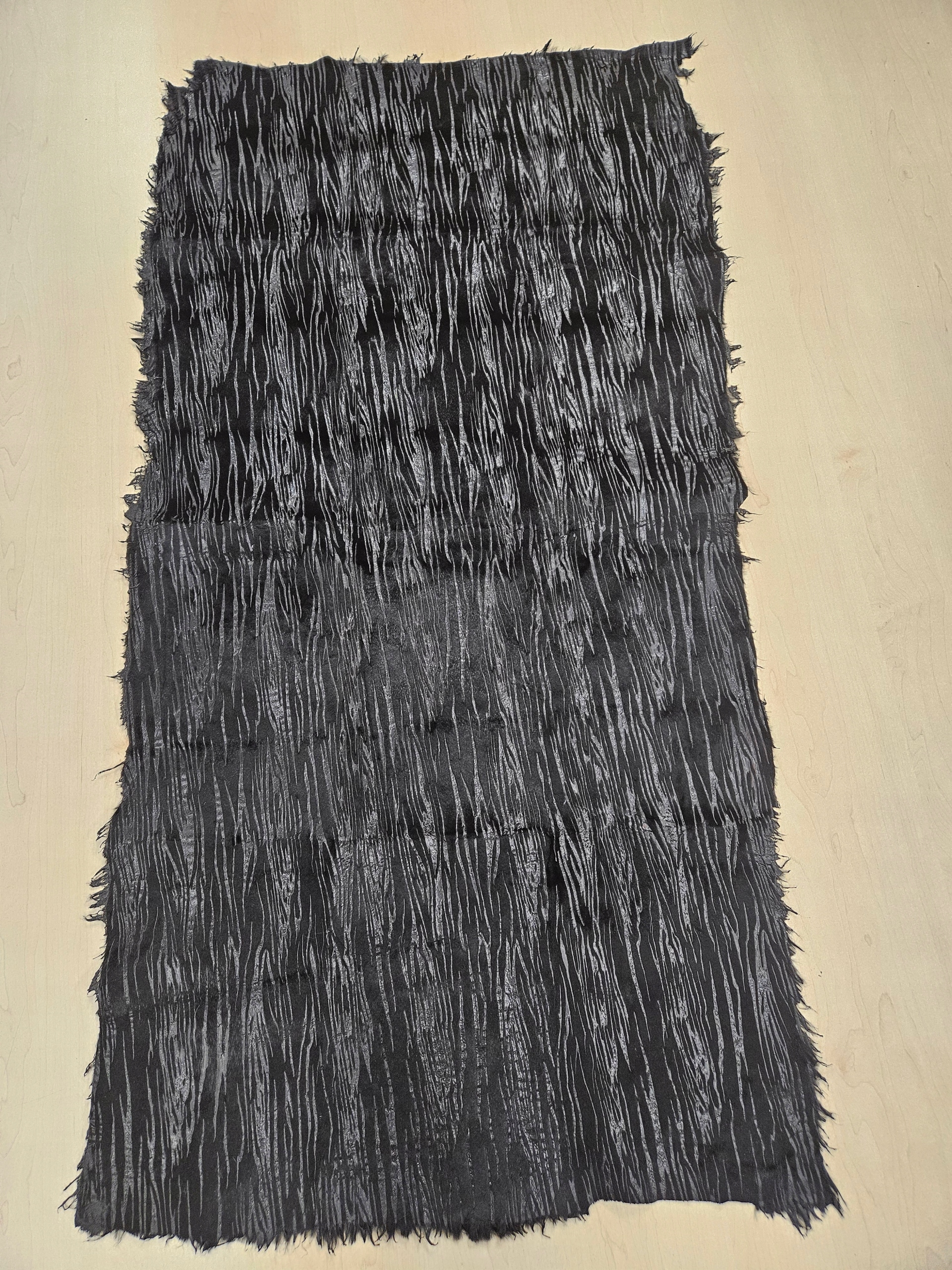 Bláto z černého králíka stříhané vytištěné