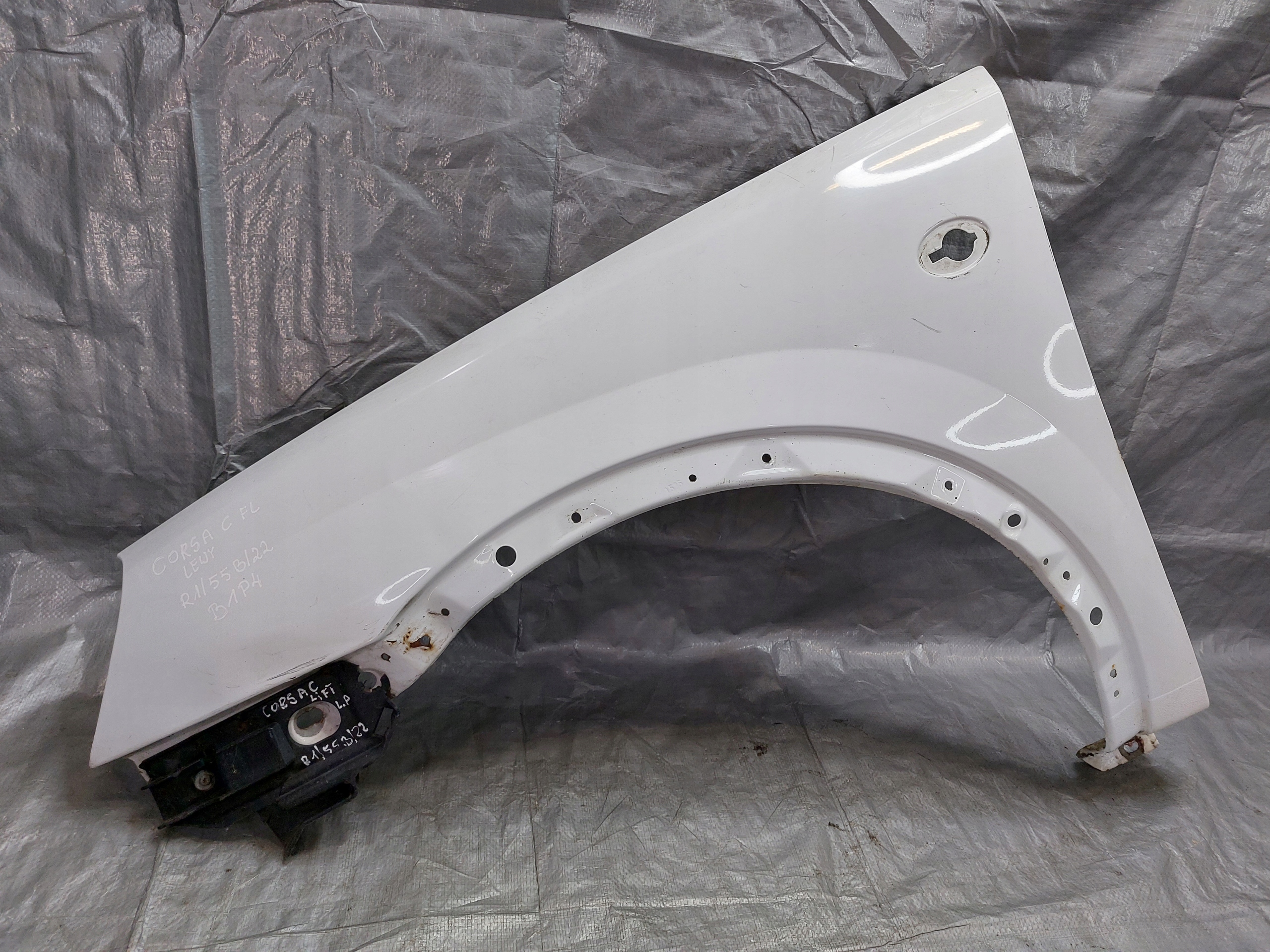 BŁOTNIK LEWY OPEL CORSA C LIFT