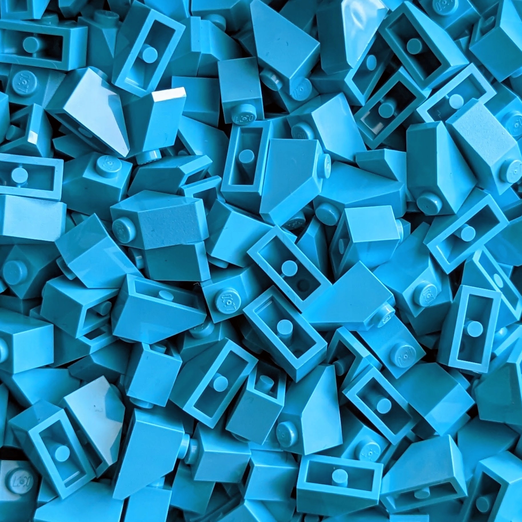 

Pakiet Lego 3040 Skos 2x1 śr. lazurowy 20szt Nowy