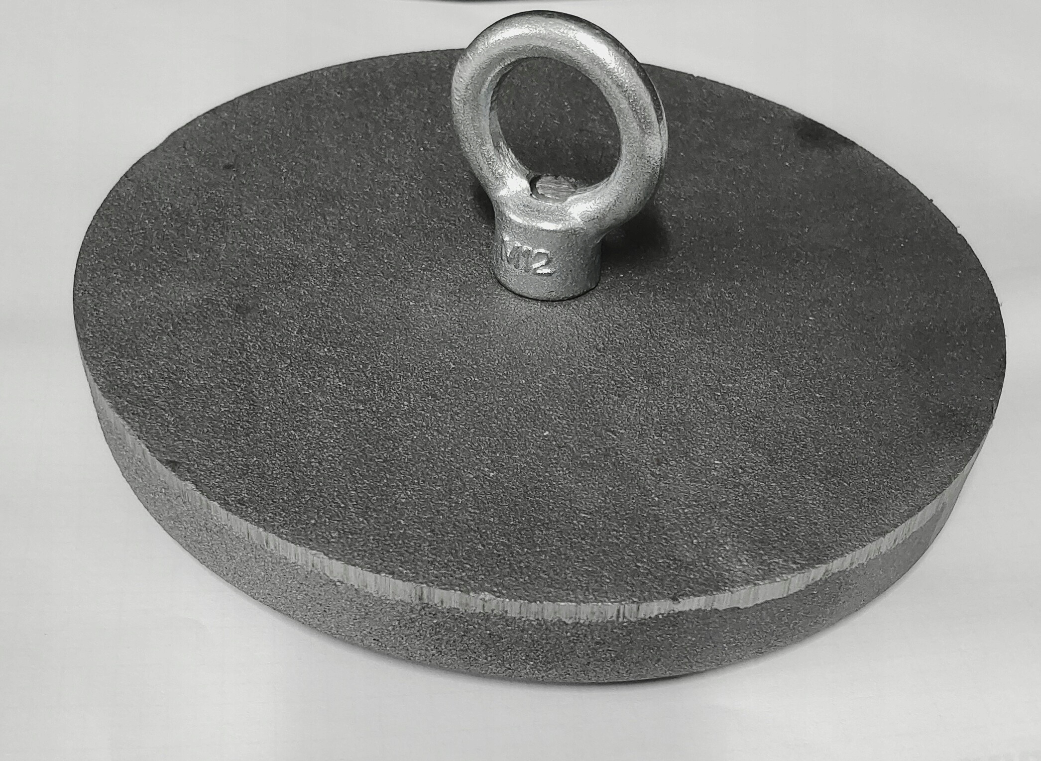 Deflektor żeliwny do pieca 210 mm z oczkiem