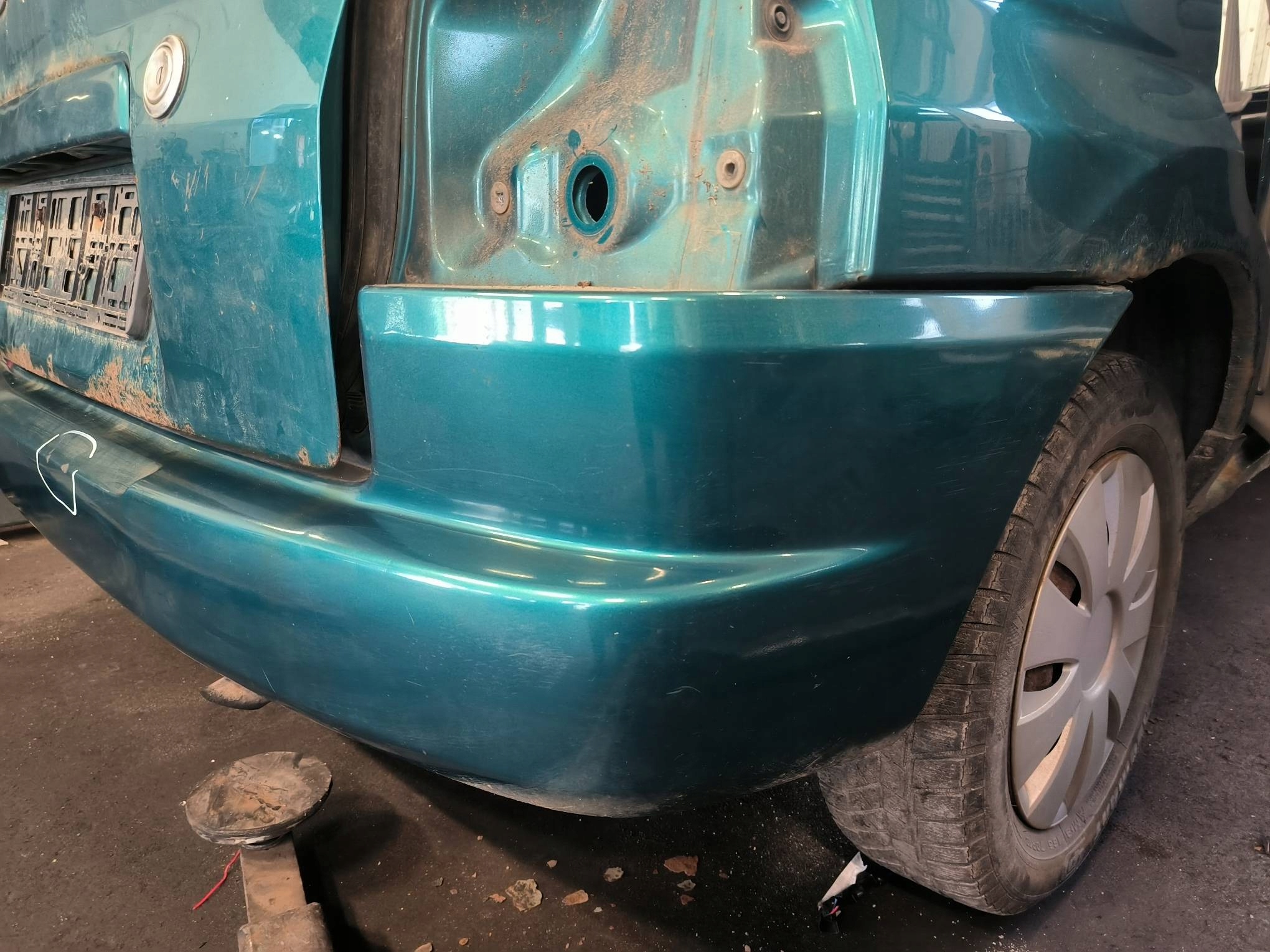 bumper rear part green MAZDA DEMIO and