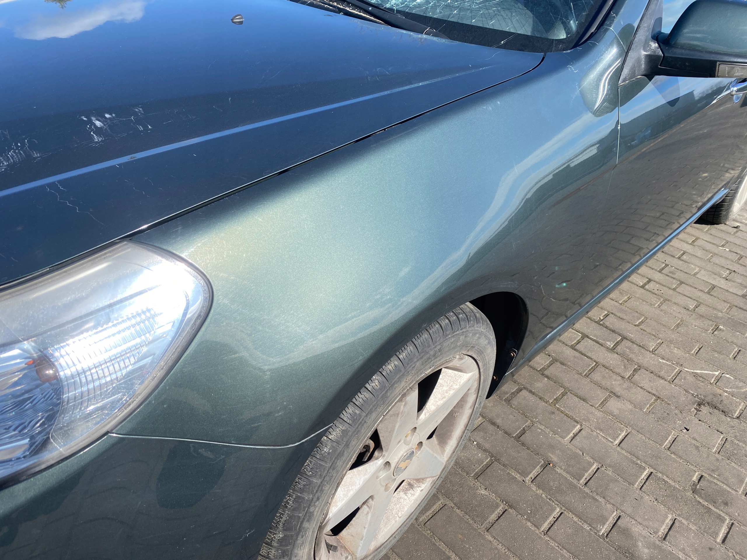 Chevrolet Epica 06-11 fender left front front kod lakieru 91U