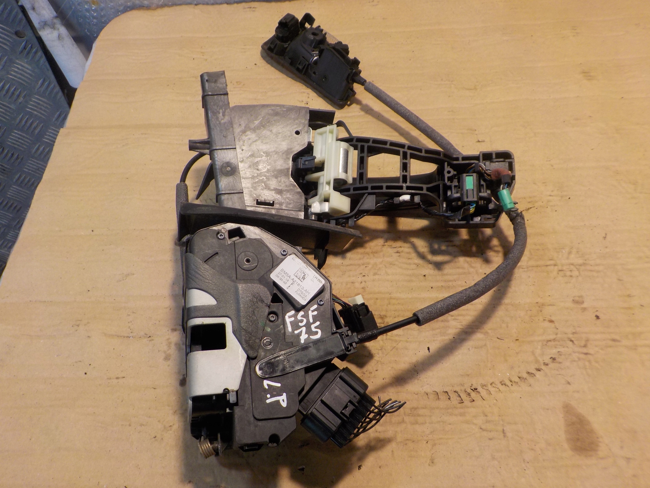 Zamek drzwi Ford OE BM5A-A21813-AH