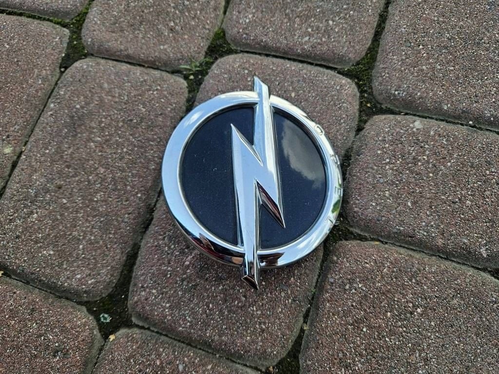 button mikrostyk of the opening bonnet boot logo logo Opel Adam