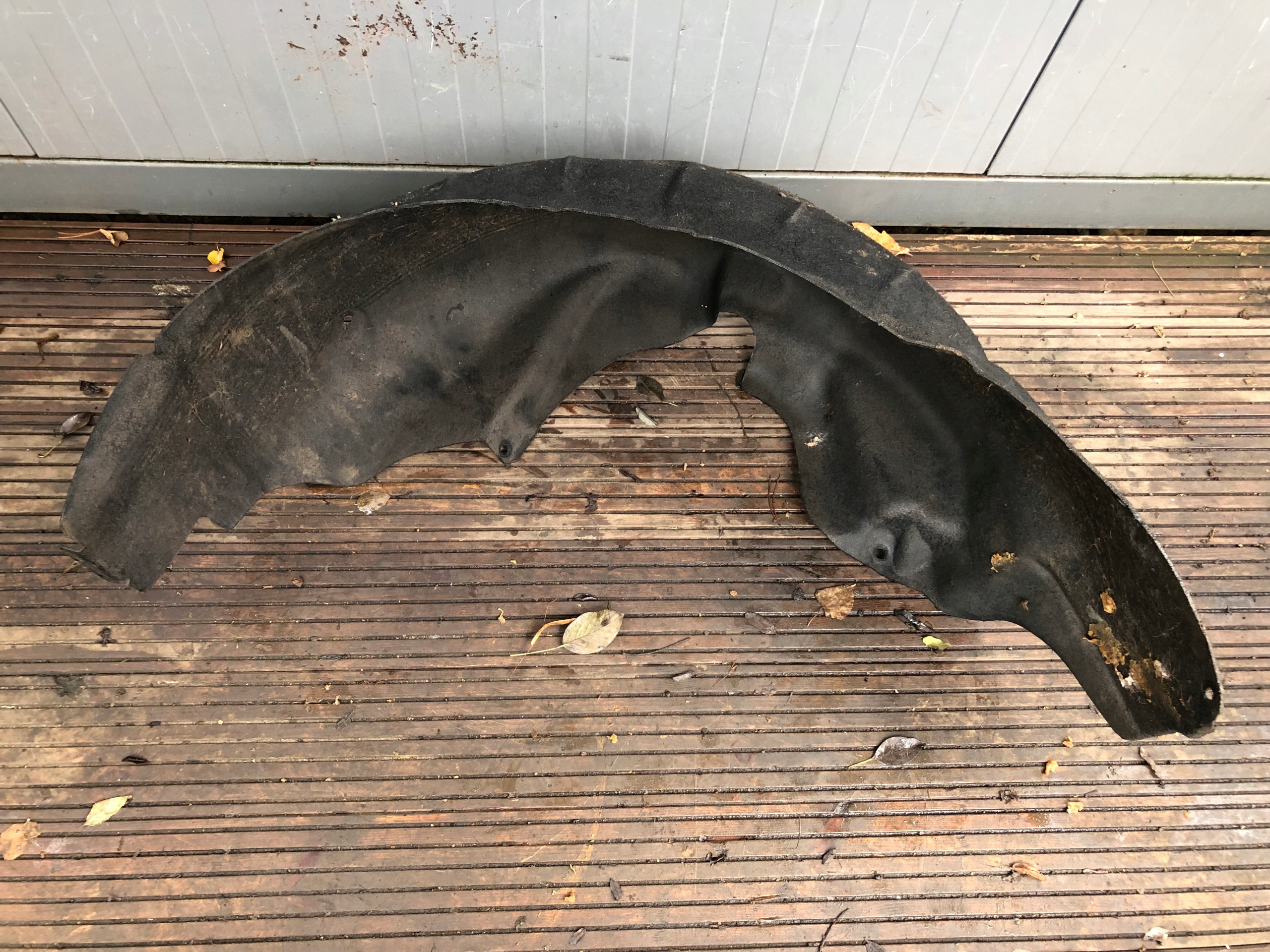 mudguard left rear part BMW E91 7143851