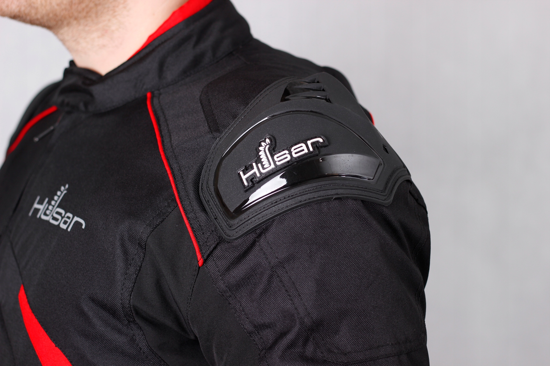 KURTKA MOTOCYKLOWA Z GARBEM HUSAR RAPID GP red Długość rękawa 63-63 cm