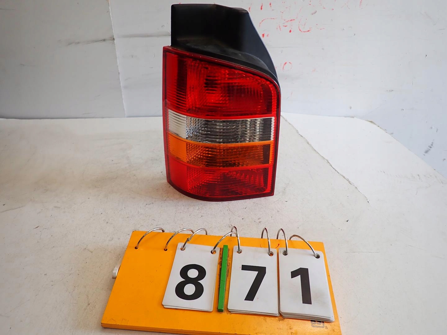 light rear part rear left VW T5 2003-2009 below klape 7H0945095J
