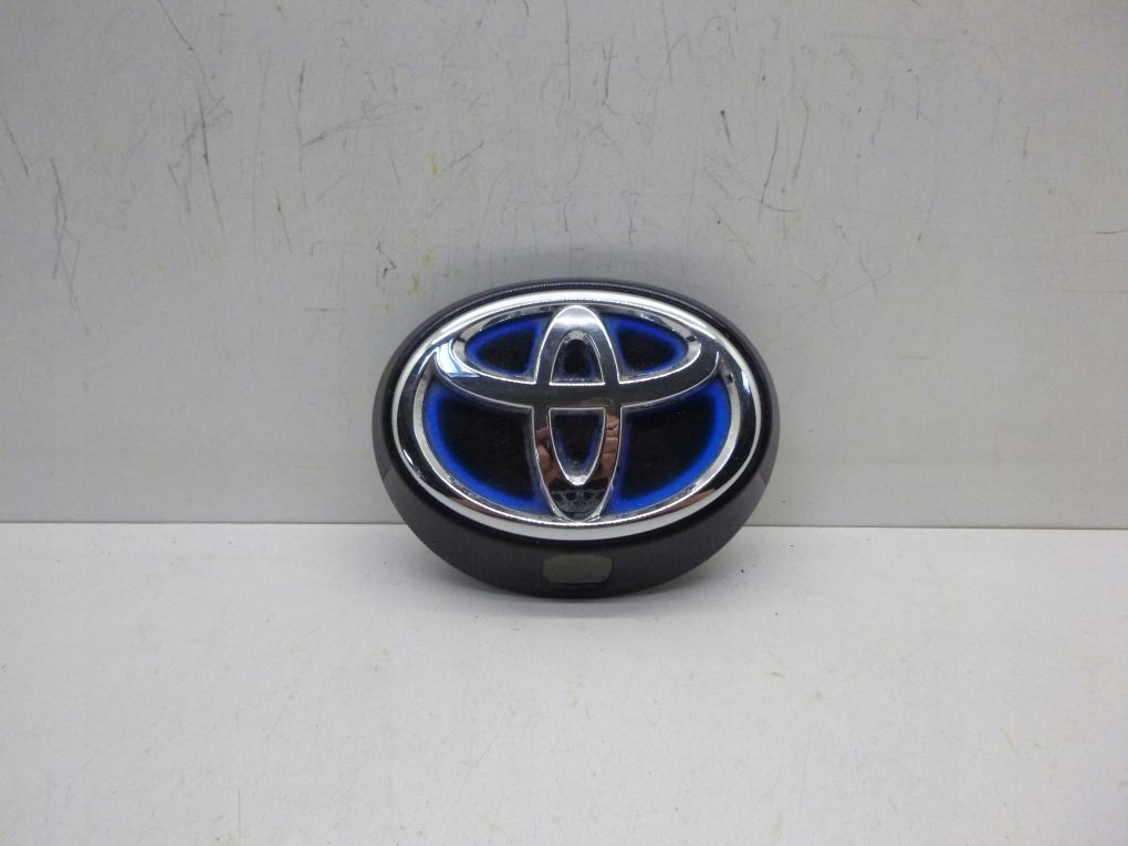 67930-02060 - TOYOTA COROLLA E21 18-емблема логотипу люка