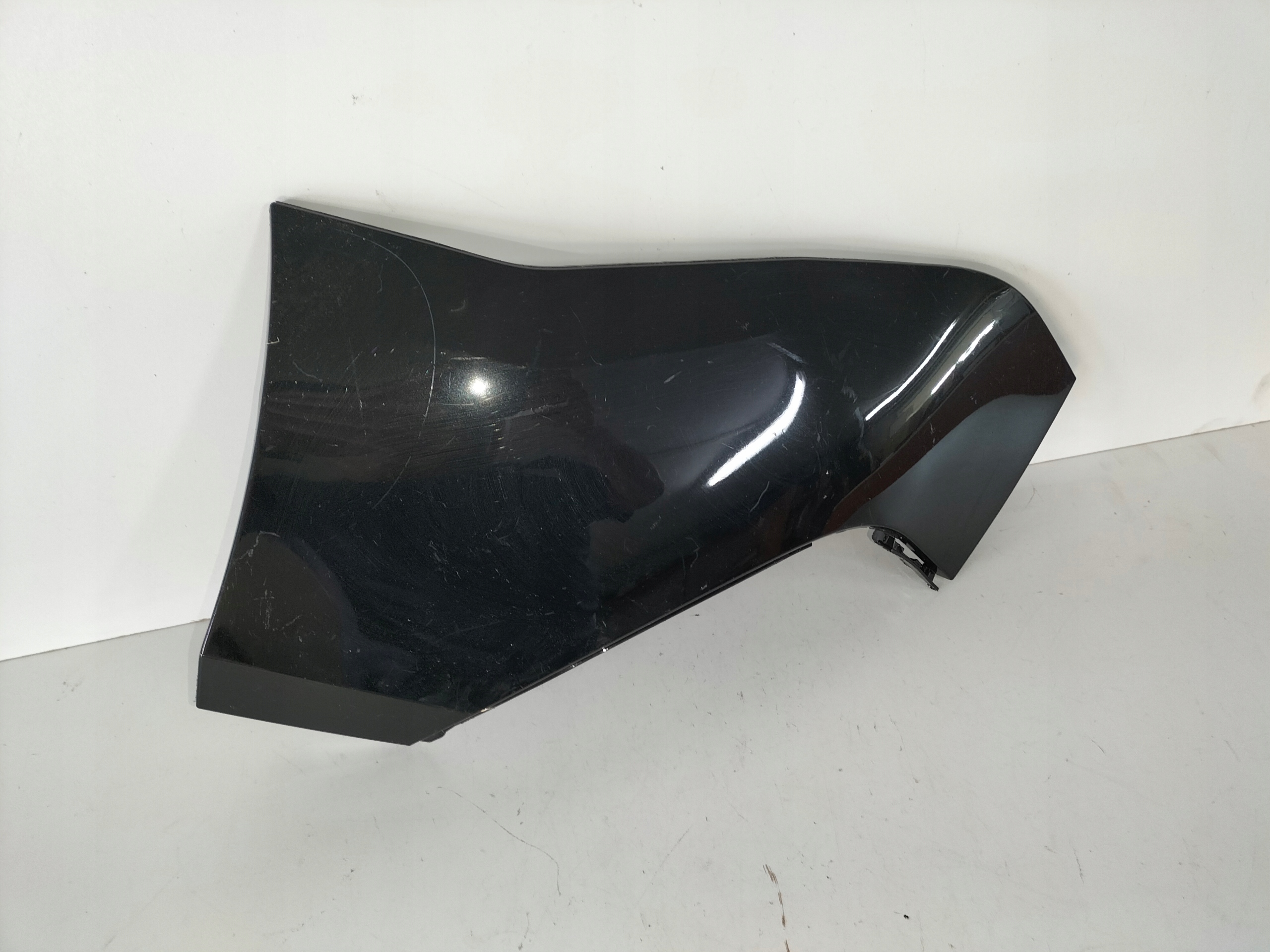 cap of a bumper rear part left BMW iX I20 21
