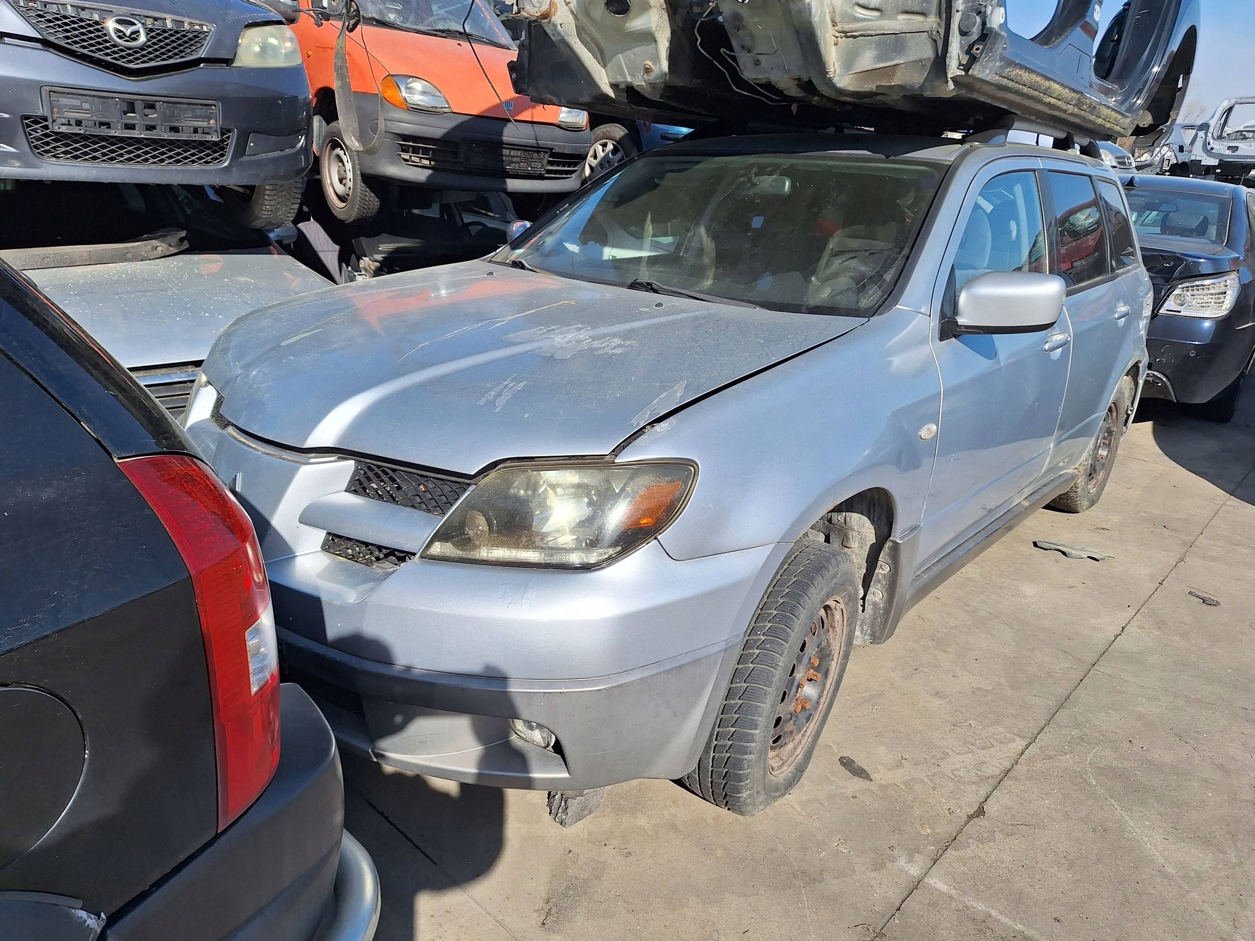 Mitsubishi OUTLANDER 1 and 2003- CU2W rear light rear part left left MN126229