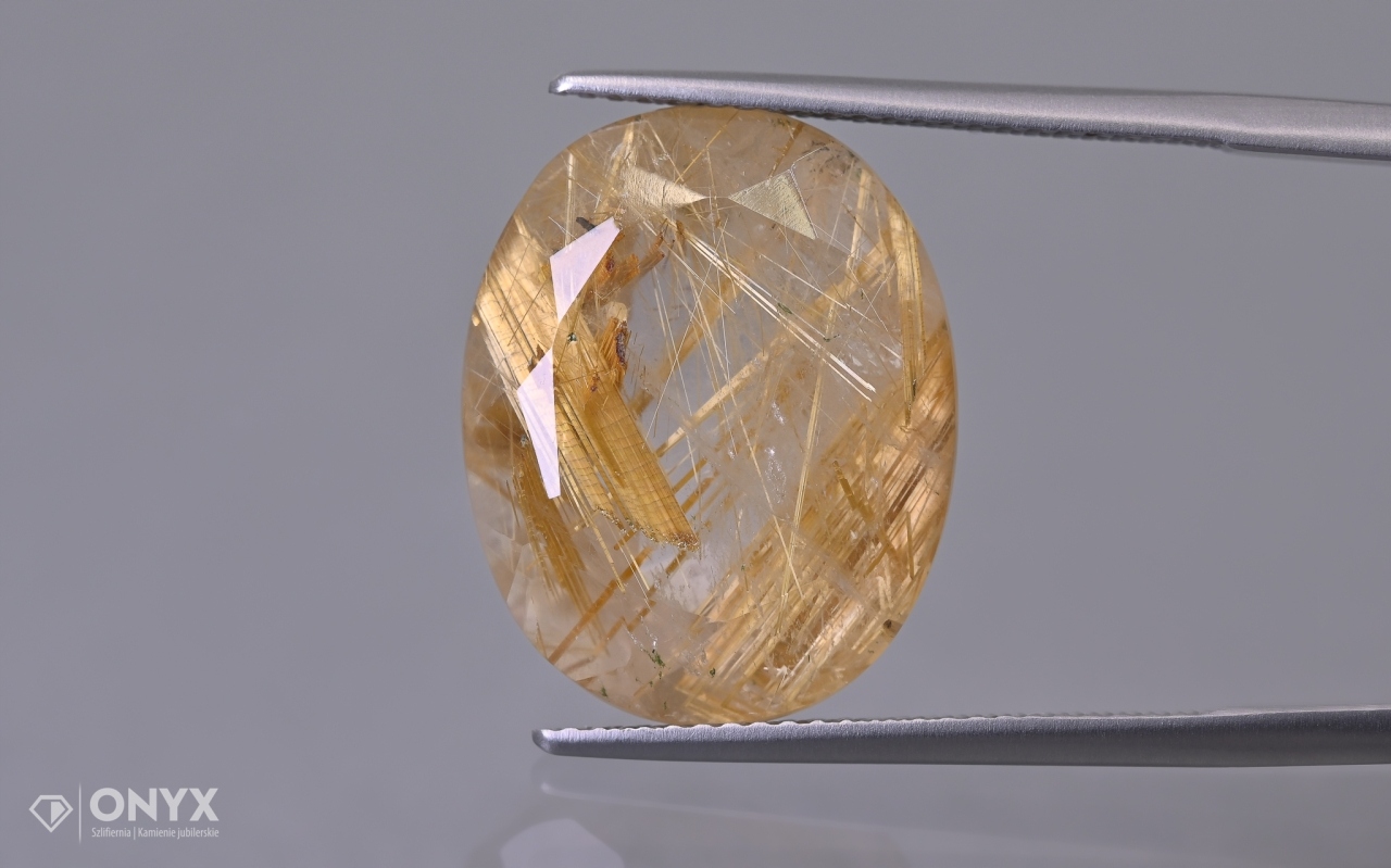 Křemen s rutilem fazetovaný ovál 18,5x15 mm