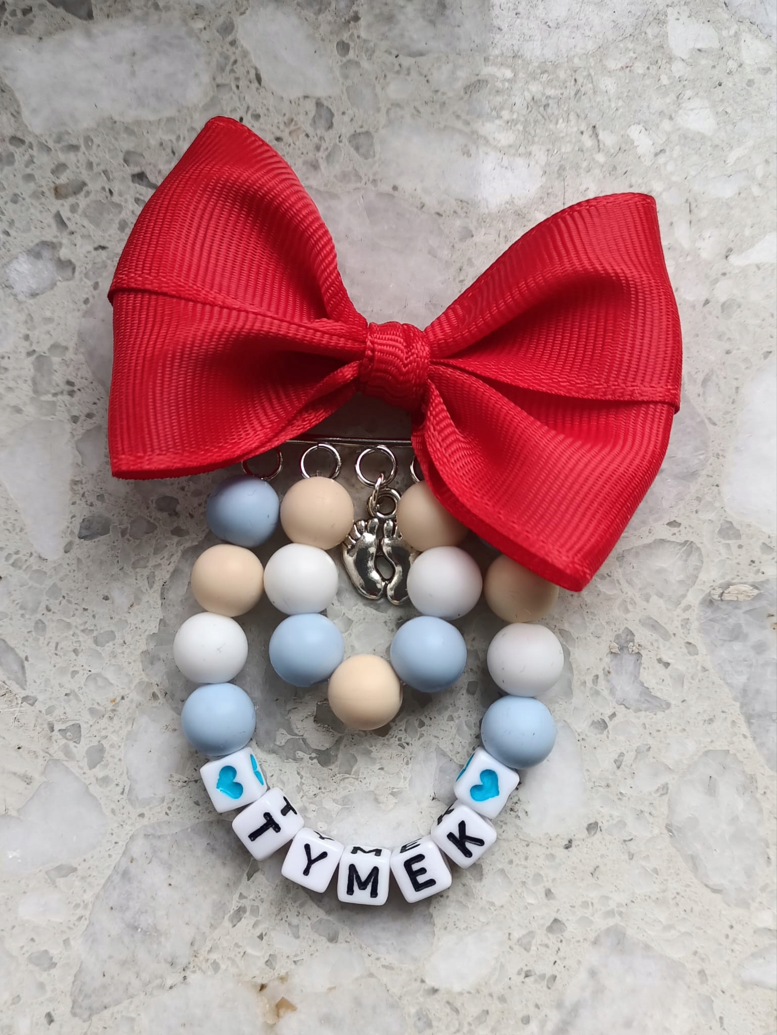 BROSZKA DO WÓZKA z czerwoną kokardką dla chłopca niebieska Stan opakowania oryginalne