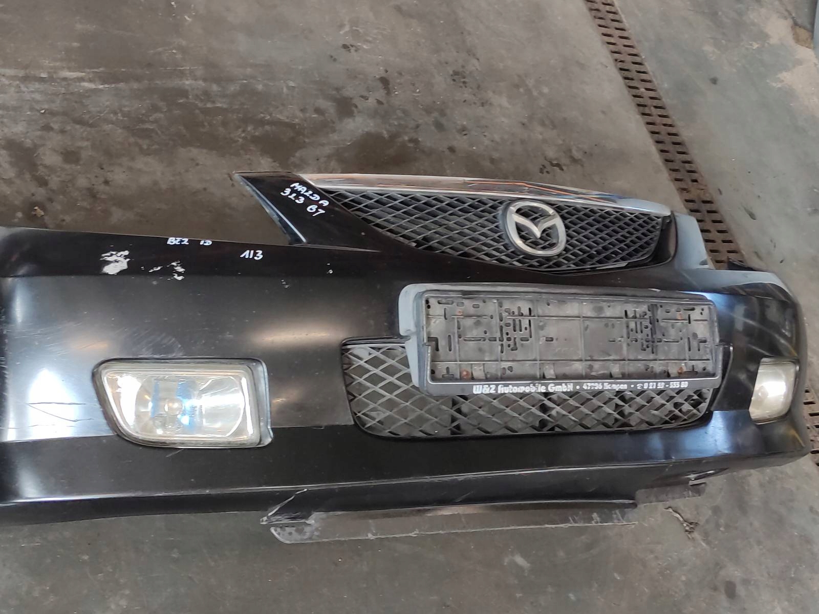 Stoßstange + Leuchte MAZDA 323 BJ