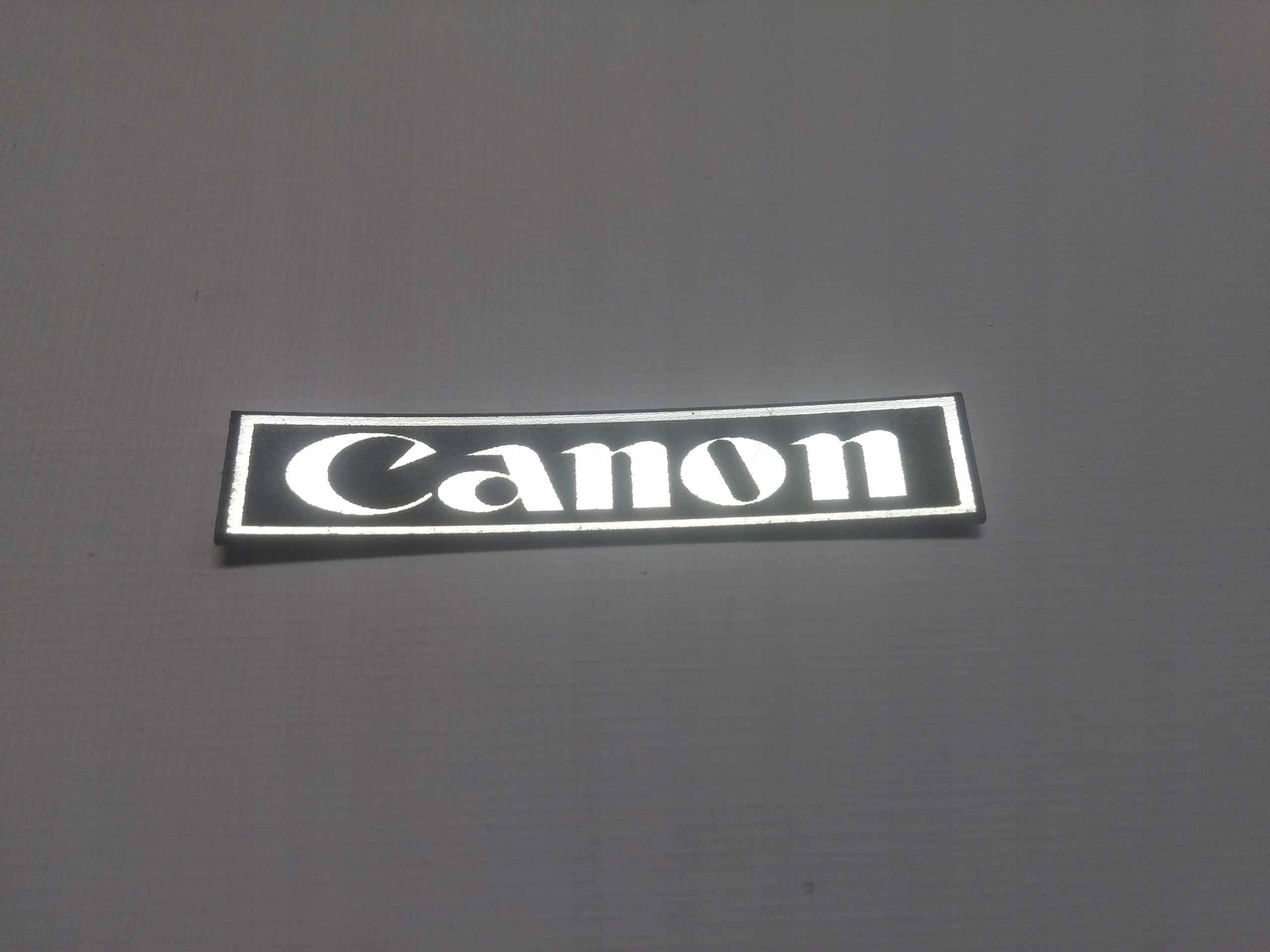 

Canon naklejka emblemat 49 x 10 mm *srebrna