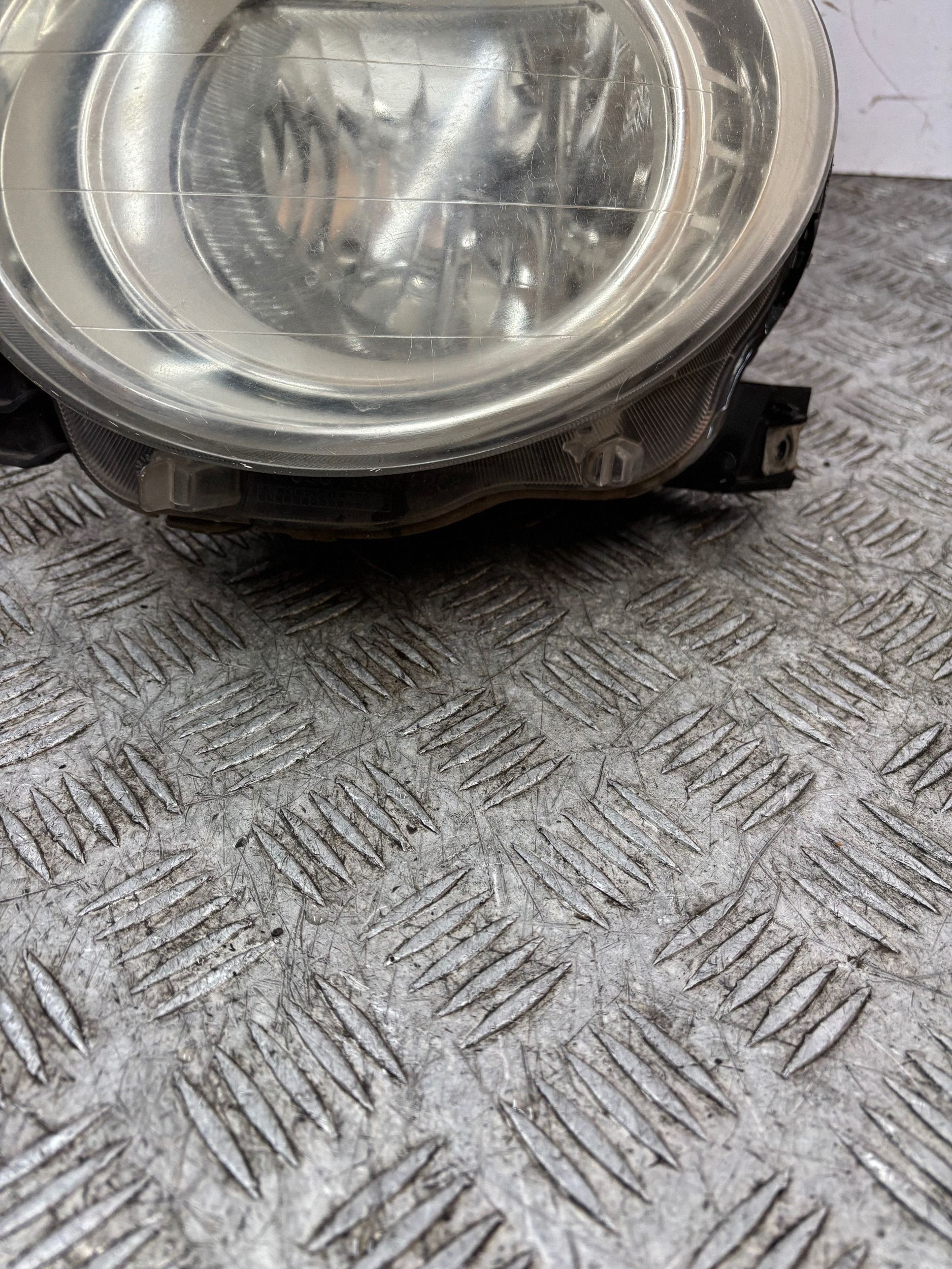REFLEKTOR light left FIAT 500 07