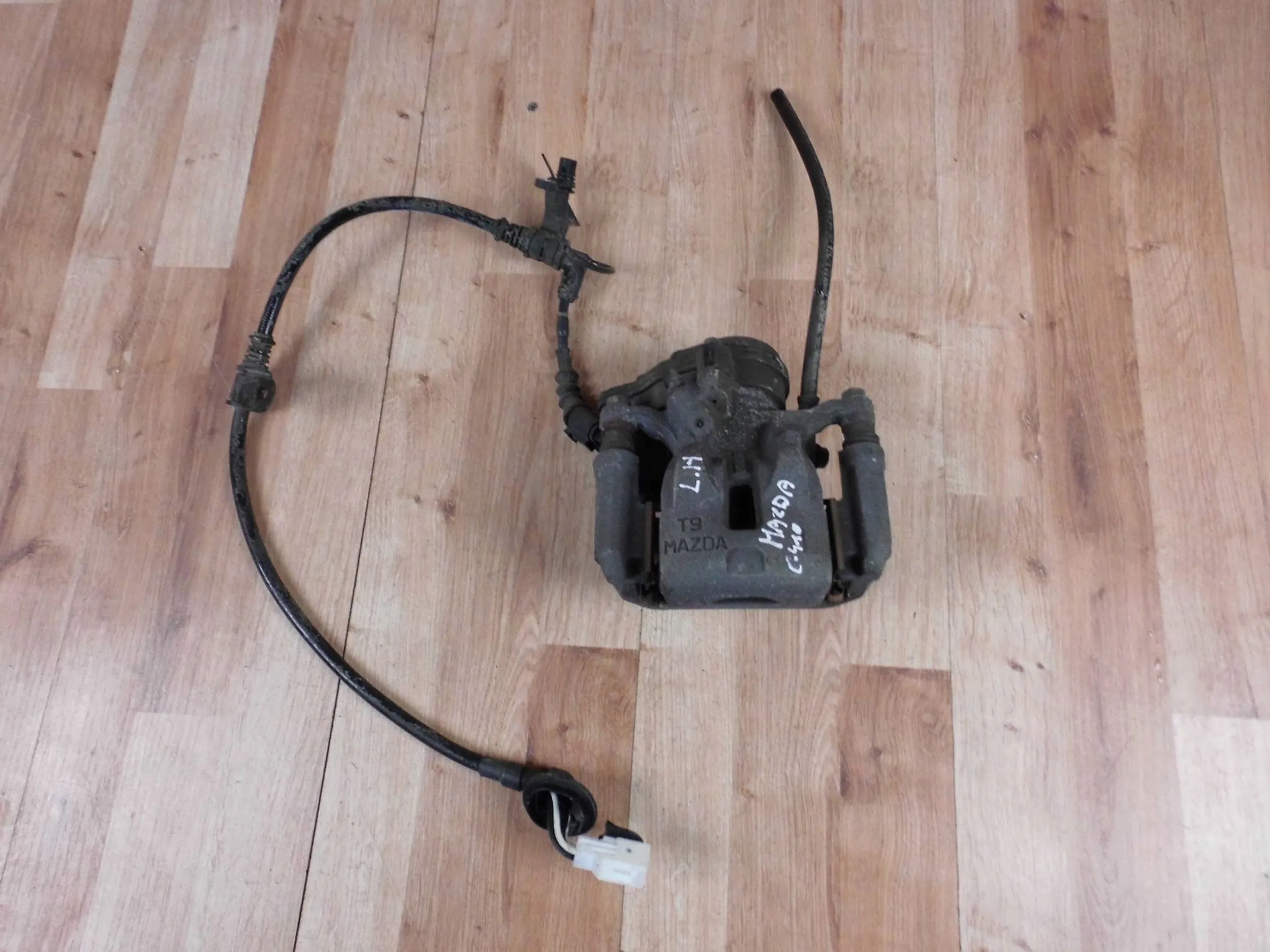 KAY0-26-71XA - Mazda CX5 II KF 2.2 D 2.5 B задній лівий Затискач