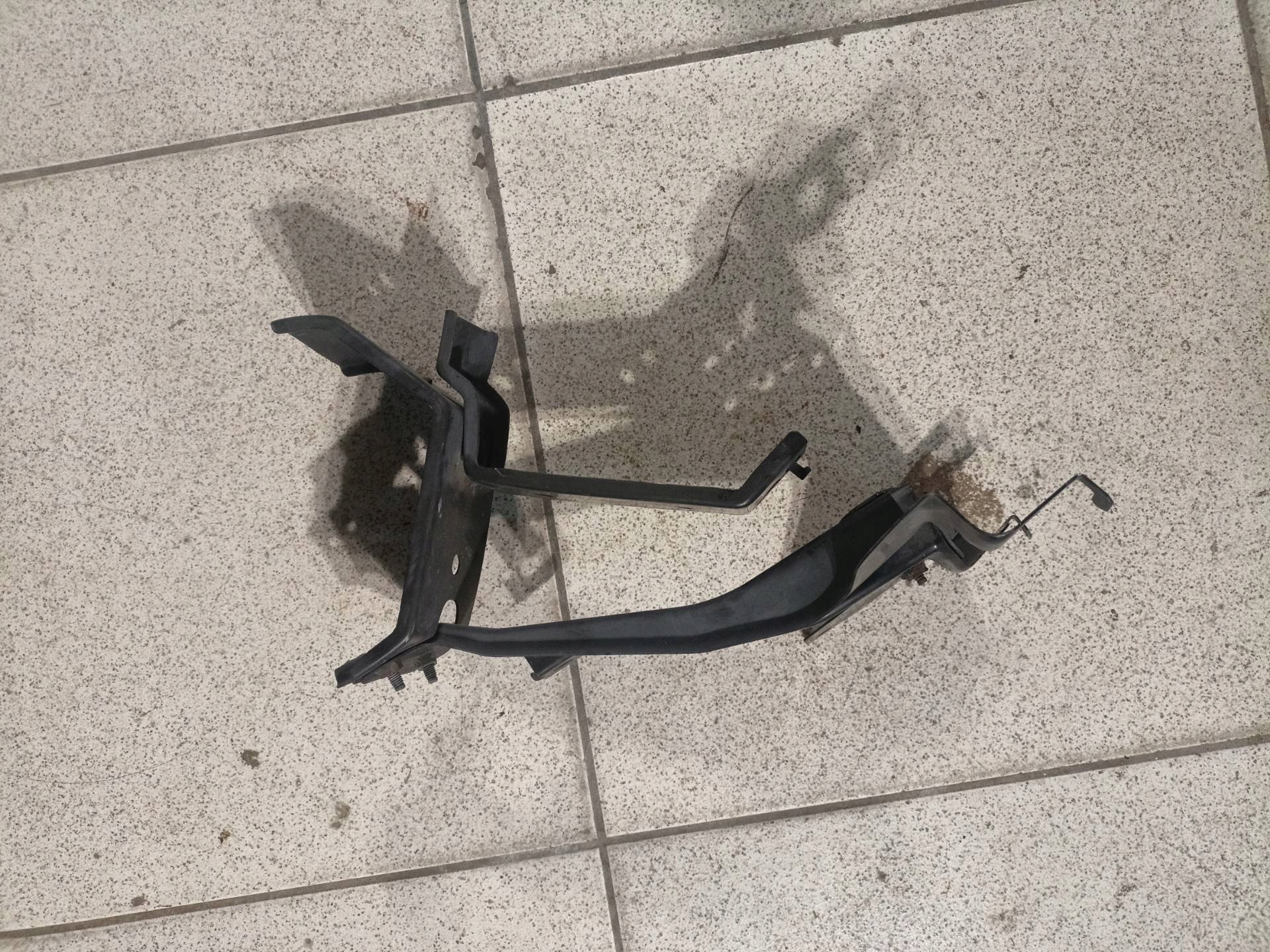 bracket of a lock bonnets Mazda CX-9 facelift 2010