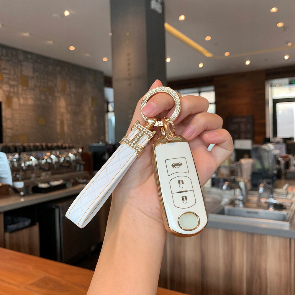 BRELOK BRELOCZEK DIAMENTY CYRKONIE SKÓRA PREMIUM Marka Inny