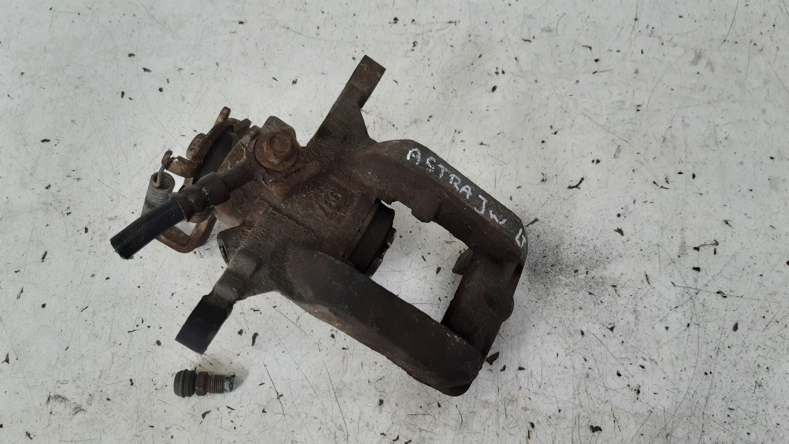 caliper rear part rear left Opel Astra J LIFT 1,7 CDTI