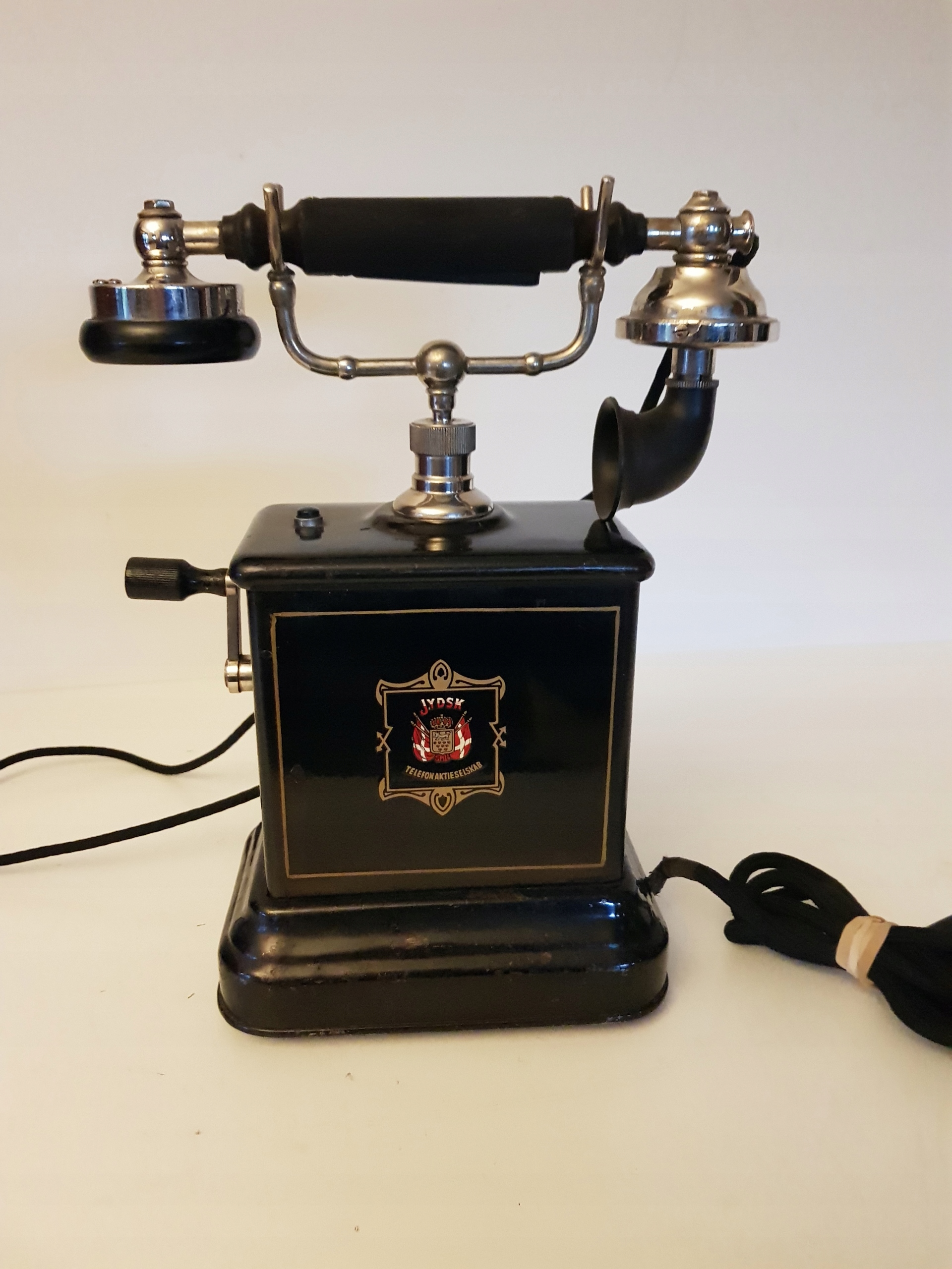 Телефон на ручку зажима Aktieselskab
