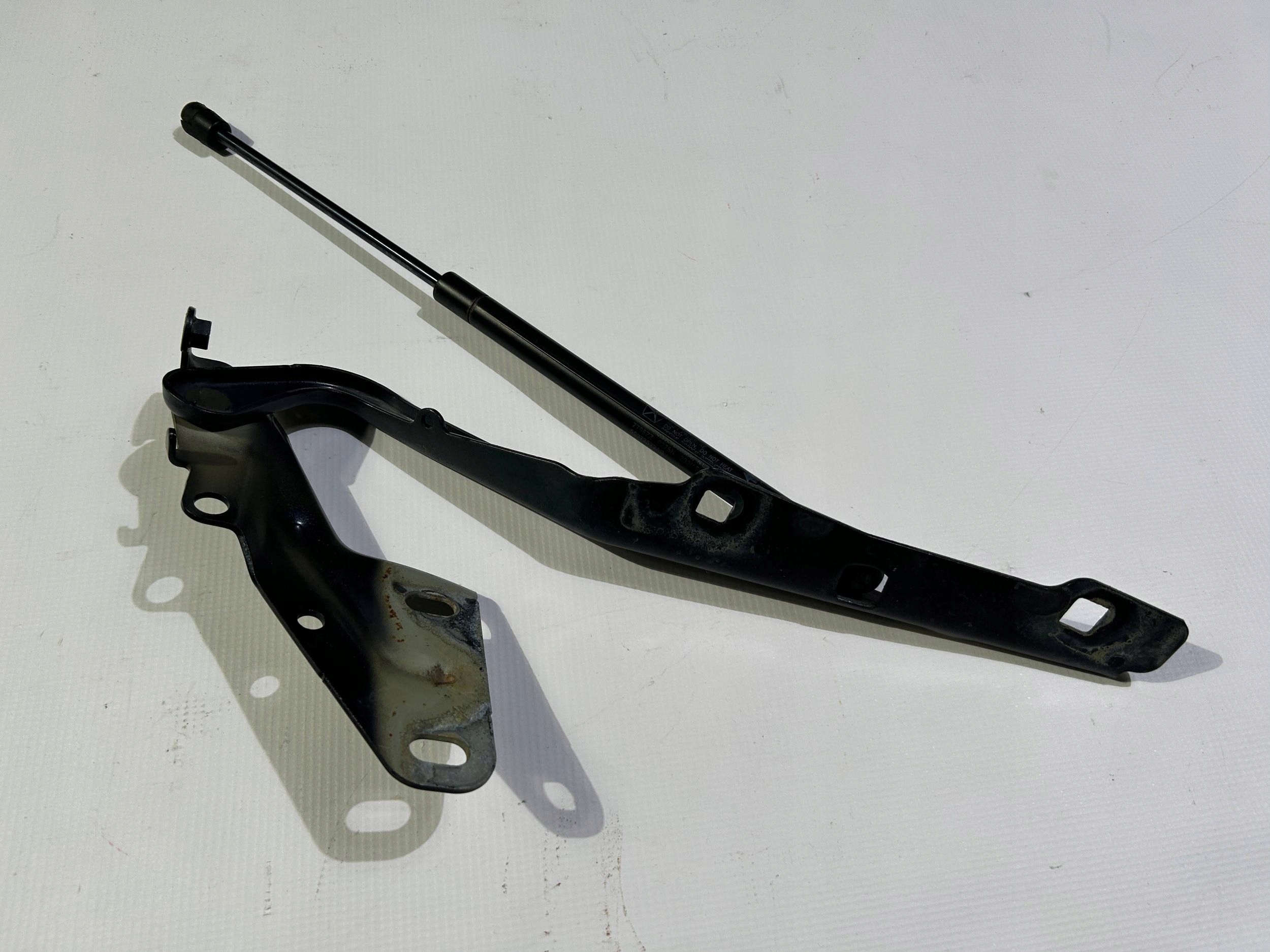 hinge bonnets left damper pokrywy of the engine original Dodge RAM 1500 2009