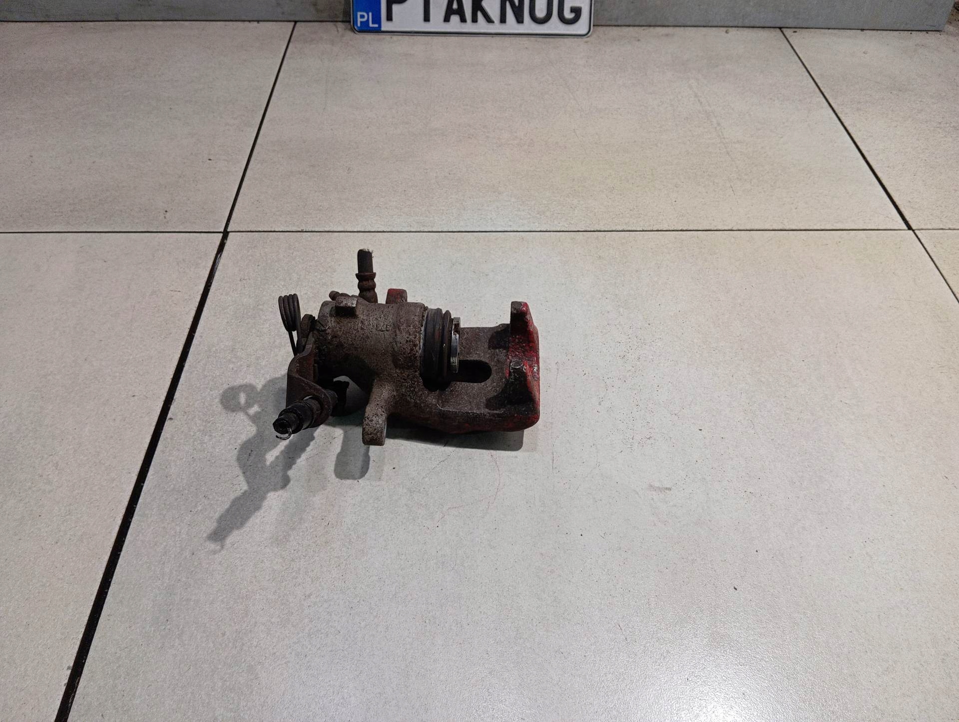 caliper OPEL left rear part ASTRA H 1.6