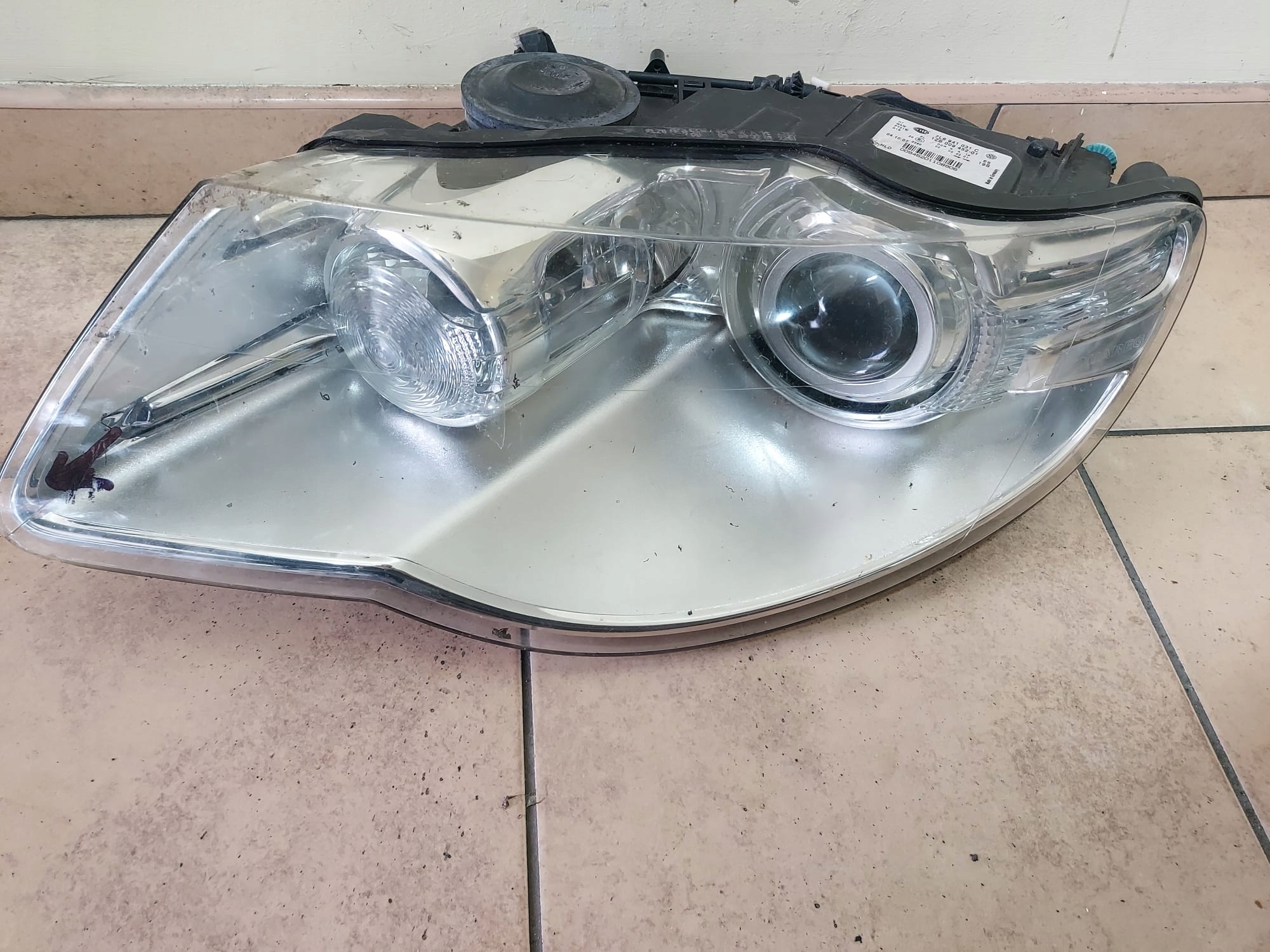 LAMPA LEWA VW TOUAREG I LIFT BI-XENON 7L6941031C