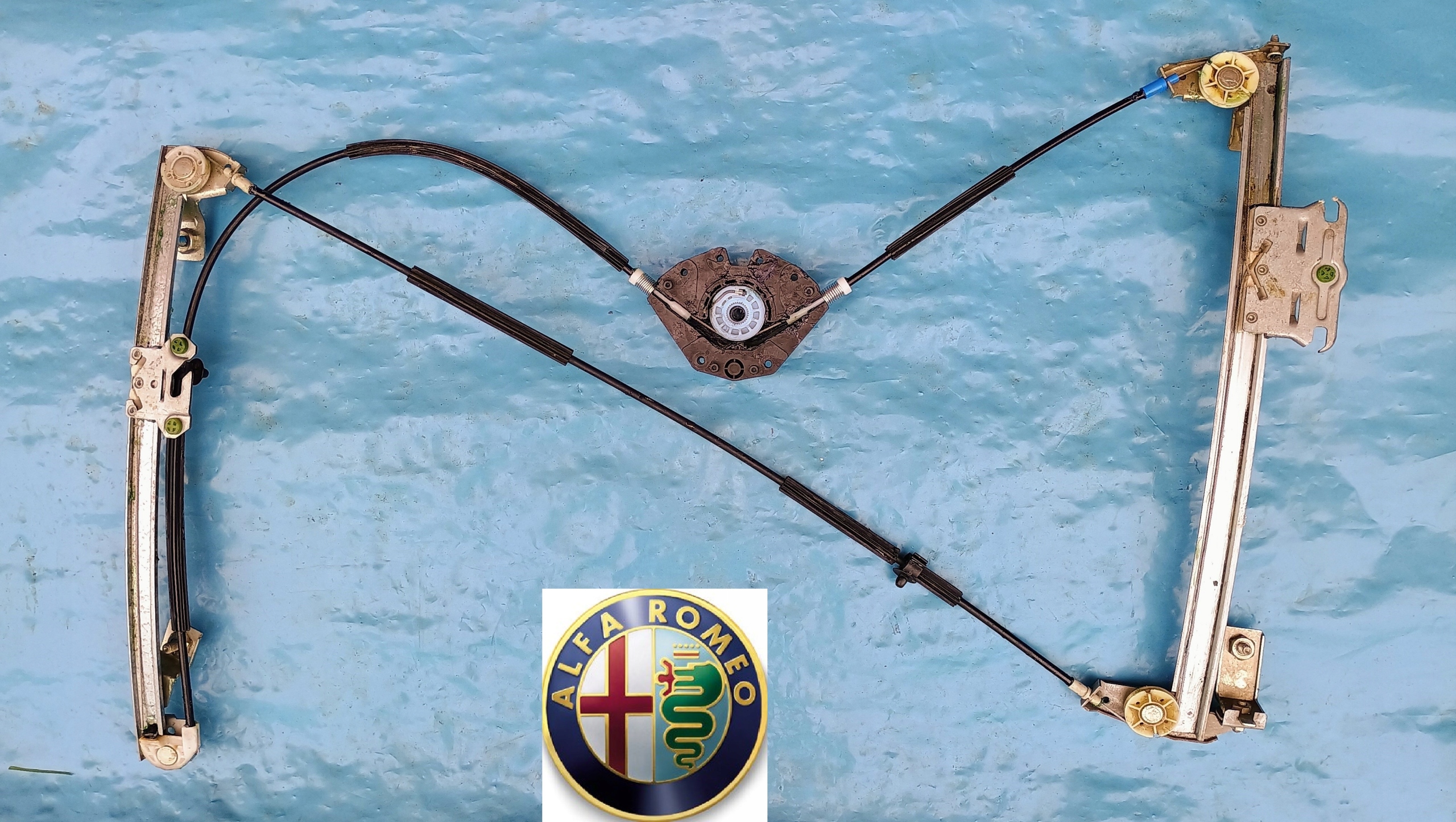 Alfa Romeo GT II 02-10 Podnośnik szyby Lewy NOWE W-WA