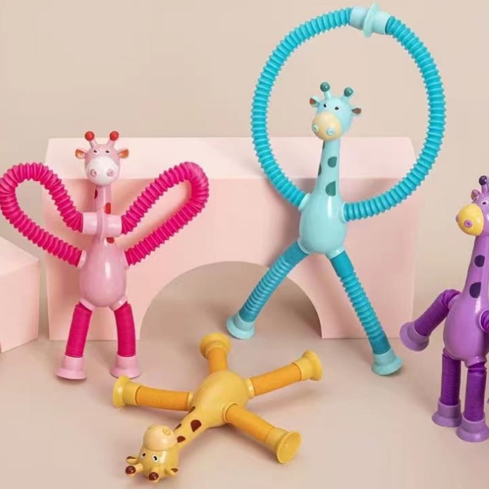 4X TELESKOPOWA PRZYSSAWKA ŻYRAFA FIGURKA SPRĘŻYNKA ROZCIĄGAJĄCE ZABAWKI Stan opakowania oryginalne