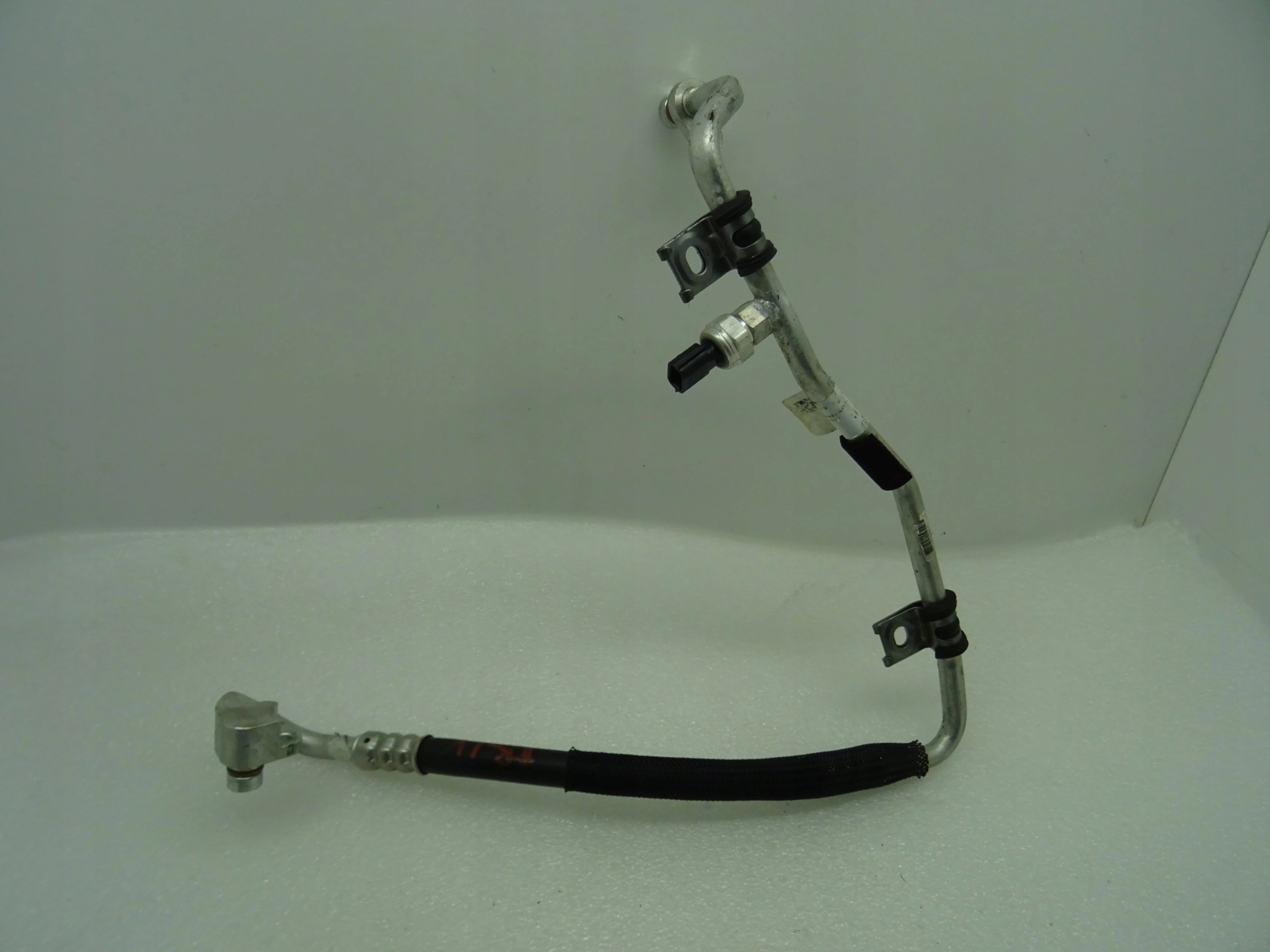 ТРУБКА КОНДИЦІОНЕРА TRAFIC IV 924905921R