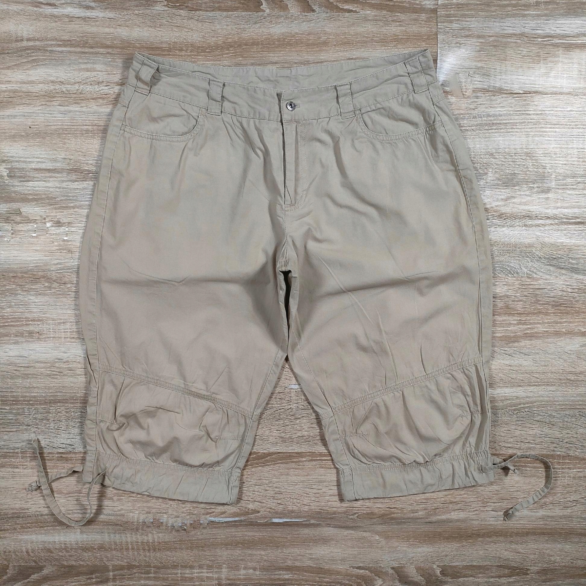 HELLY HANSEN Spodenki 3/4 Logowane Beżowe r.32 Rozmiar 32