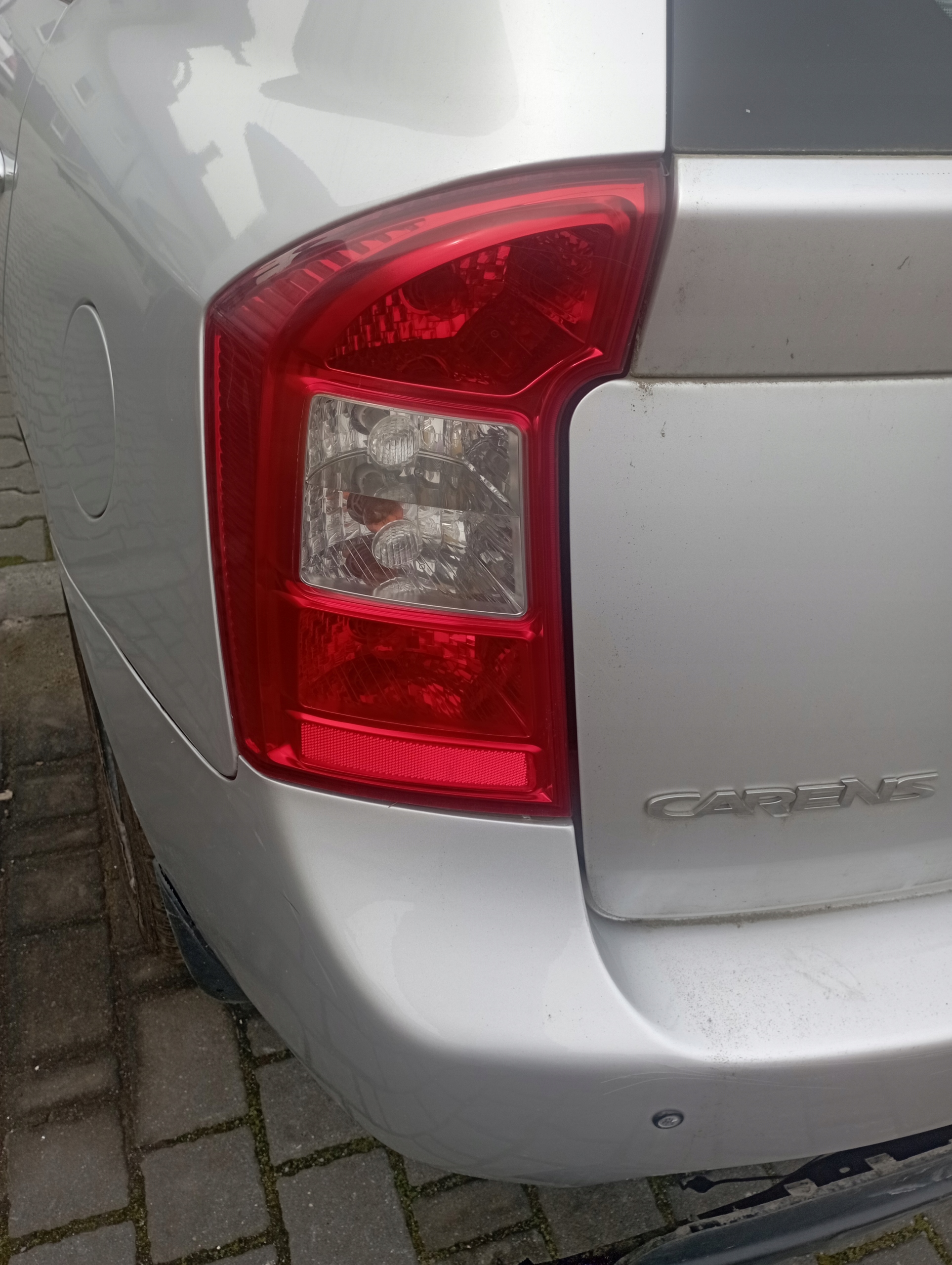 kia CARENS III фонарь левый европа