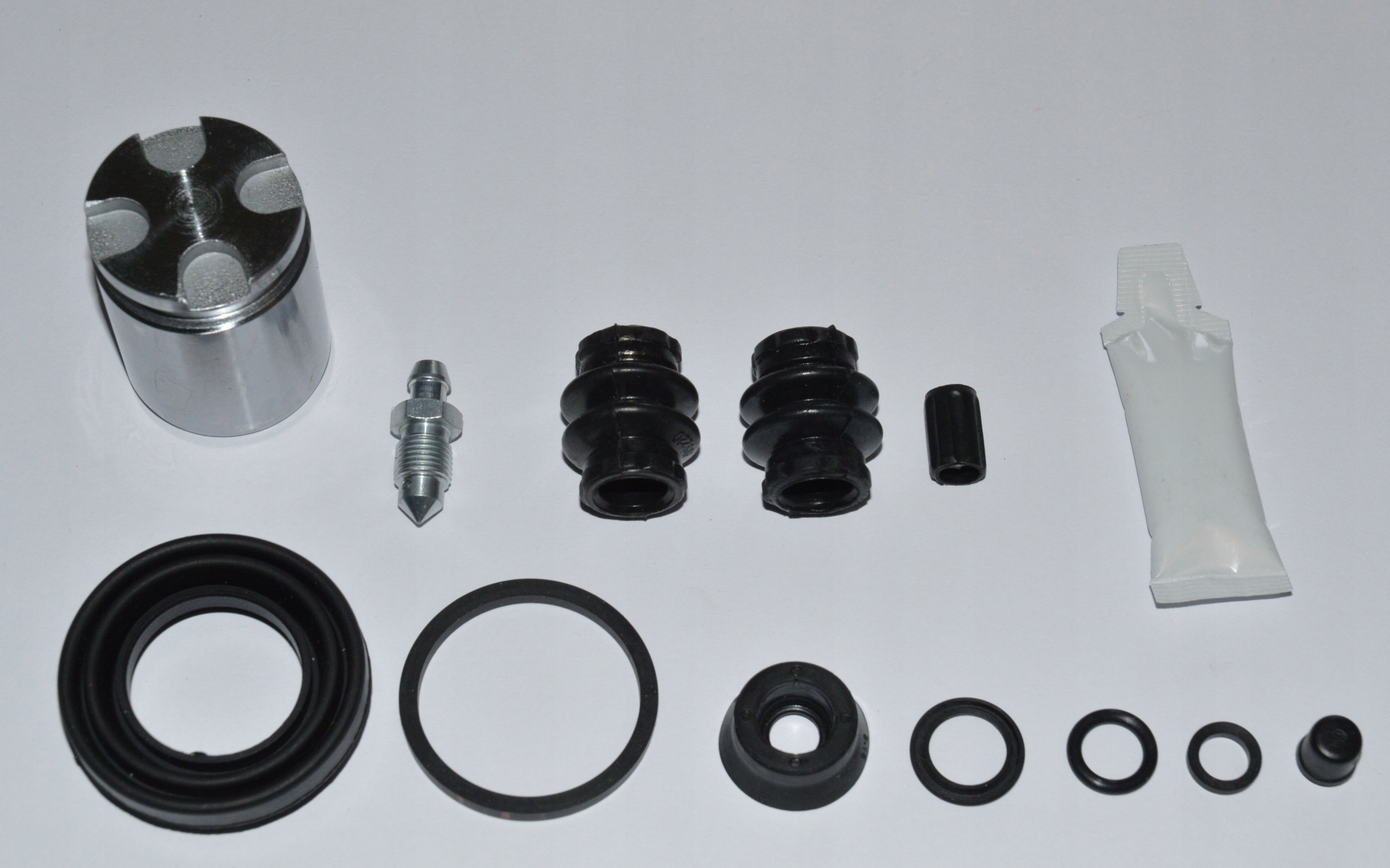 Ремкомплект тормозного суппорта заднего королла 150. Ремкомплект суппорта 238051. Ремкомплект заднего суппорта форд фокус 2. Hyundai solaris 2012 ремкомплект суппорта заднего. Ремкомплект заднего суппорта.