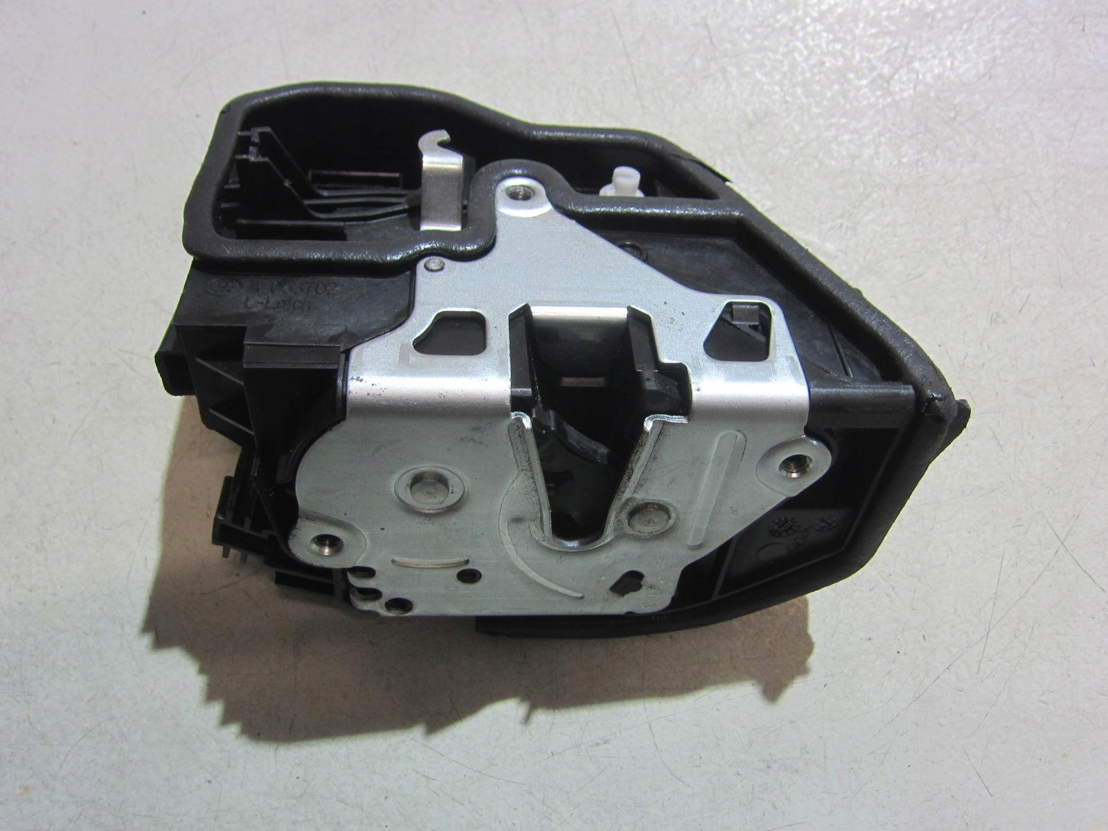 BMW F30 F10 E70 X3 ZAMEK DRZWI PRAWY PRZÓD 7229458