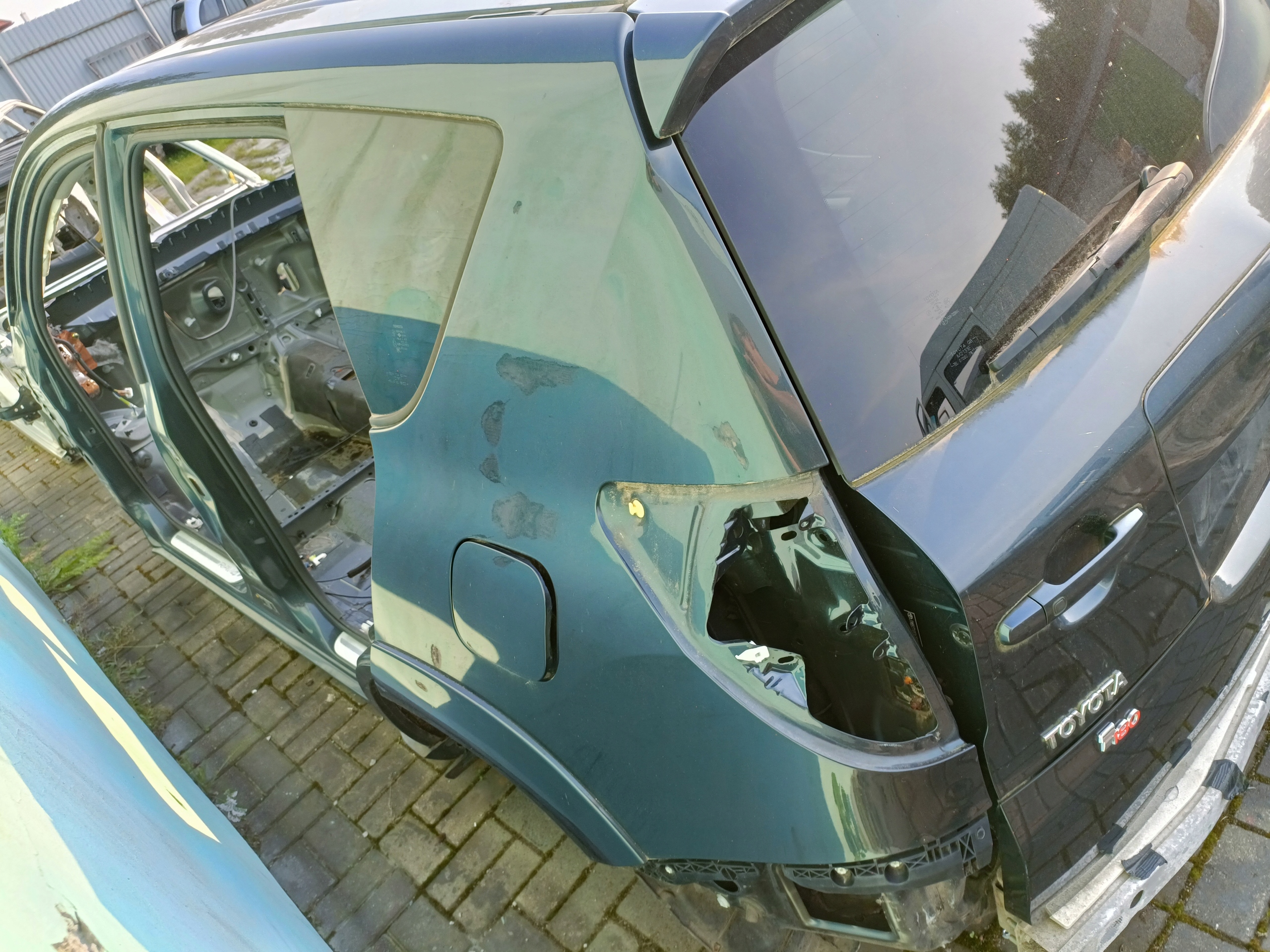 BŁOTNIK LEWY TYŁ ĆWIARTKA TOYOTA RAV4 III 06-12r.