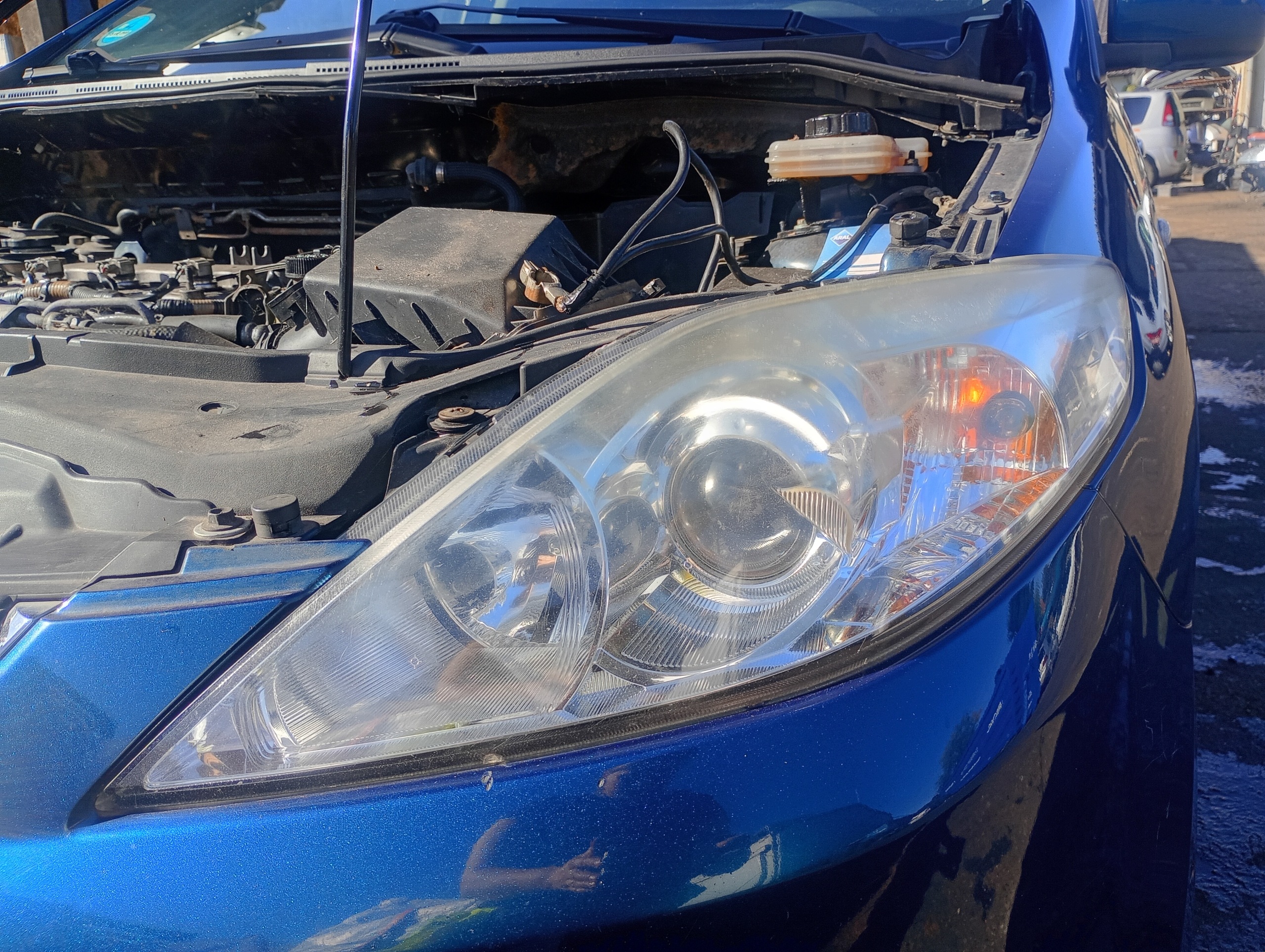 Reflektor light left front front Mazda 5 V 05-10